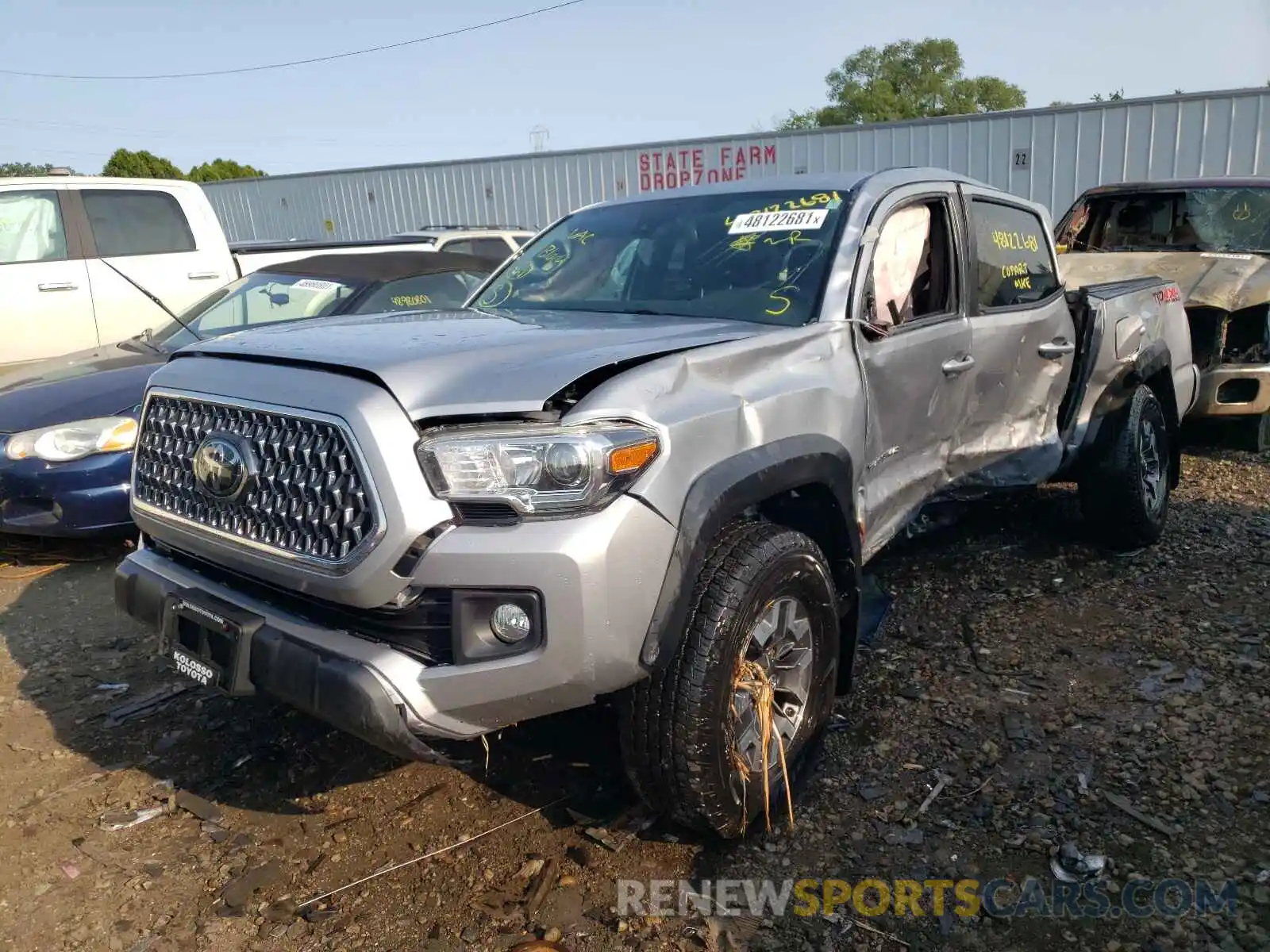 2 Photograph of a damaged car 3TMCZ5AN9KM260360 TOYOTA TACOMA 2019