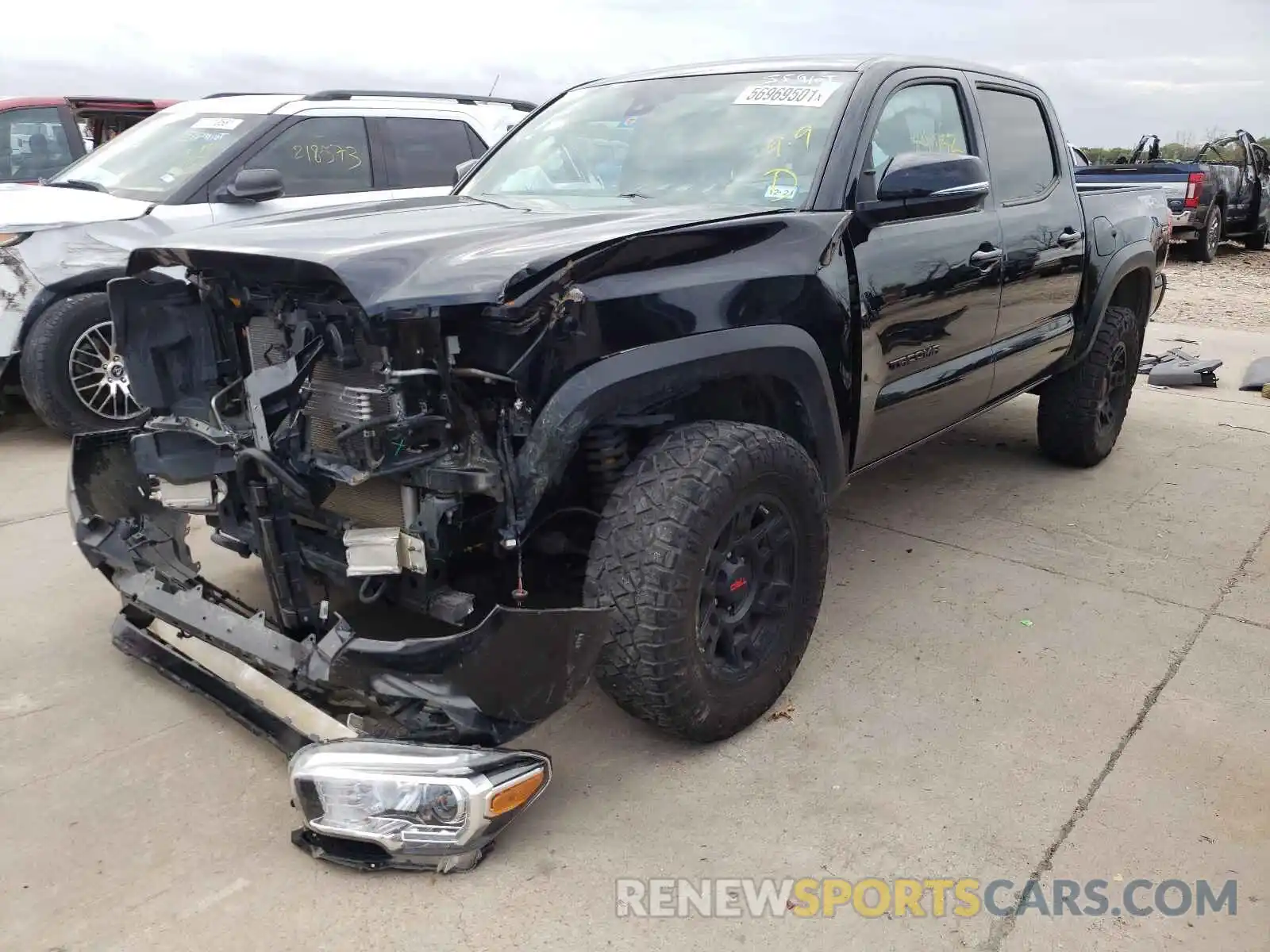 2 Photograph of a damaged car 3TMCZ5AN9KM262044 TOYOTA TACOMA 2019