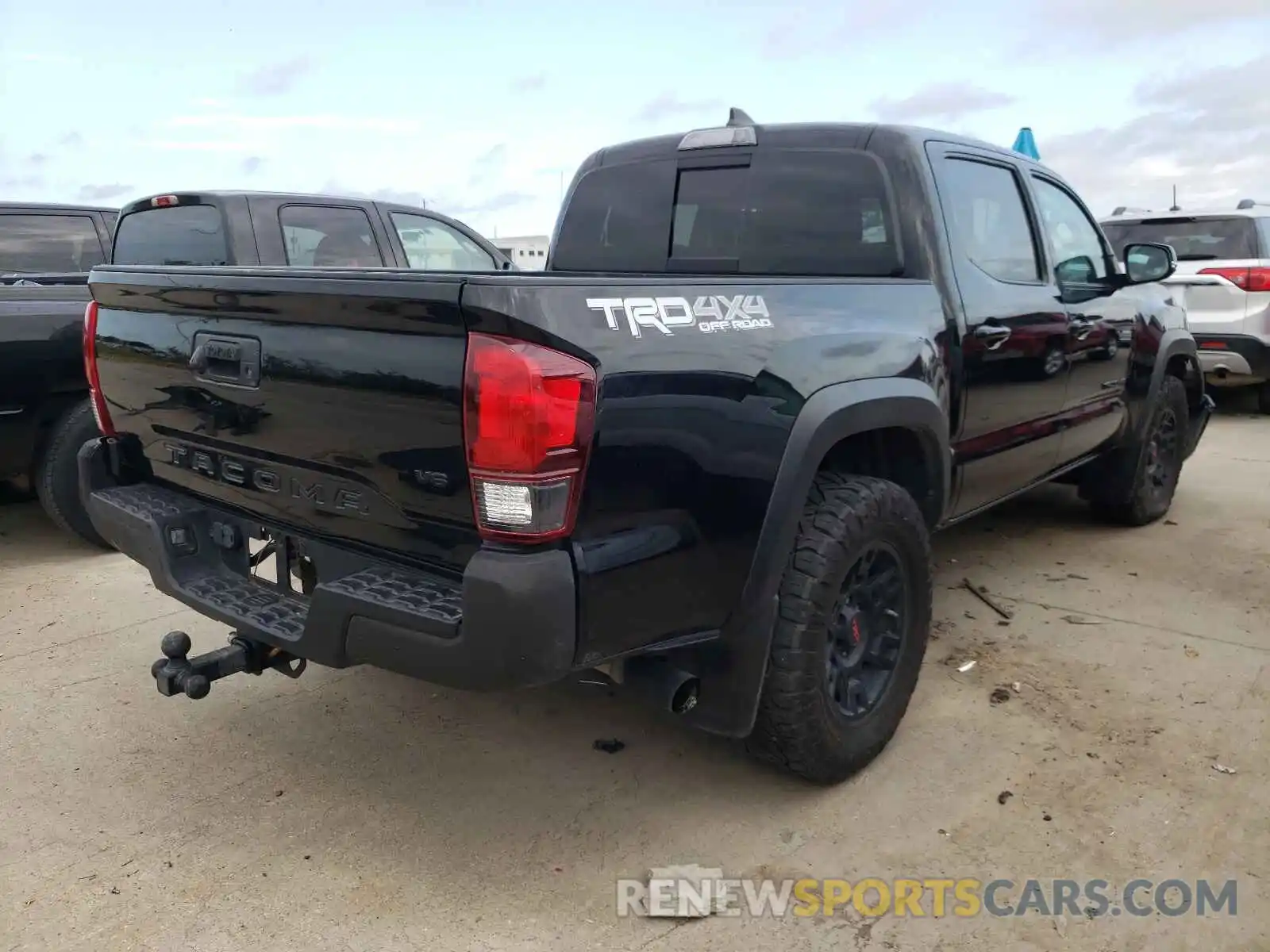 4 Photograph of a damaged car 3TMCZ5AN9KM262044 TOYOTA TACOMA 2019