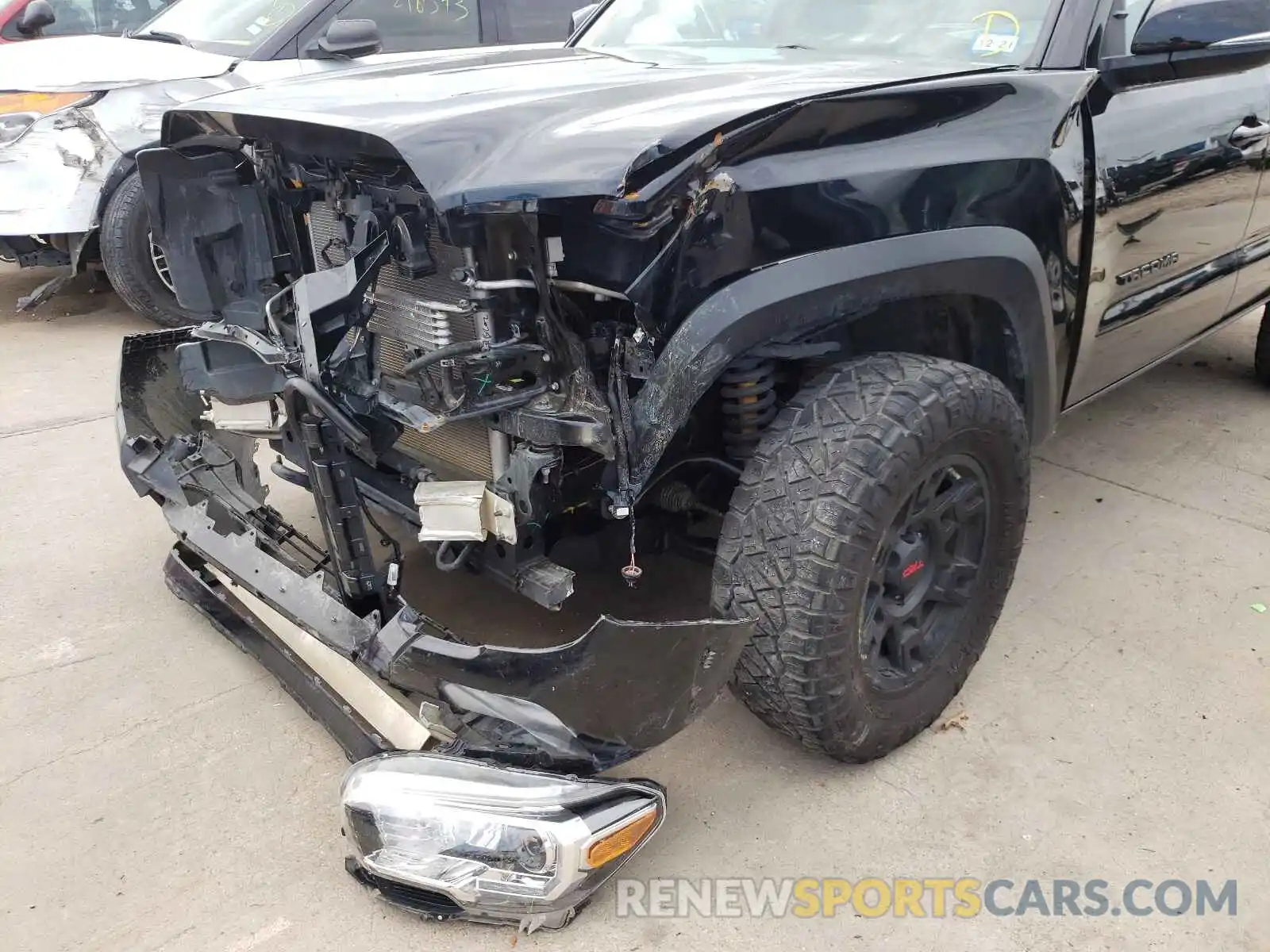 9 Photograph of a damaged car 3TMCZ5AN9KM262044 TOYOTA TACOMA 2019