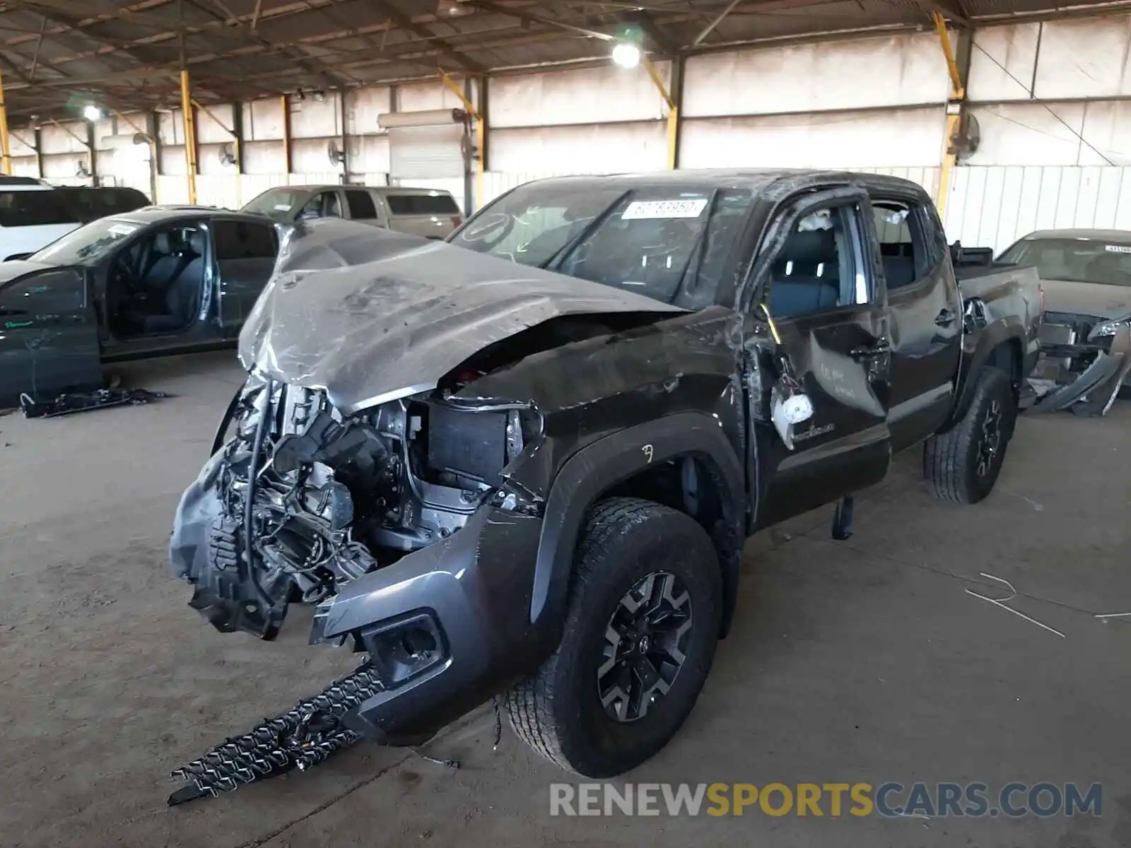 2 Photograph of a damaged car 3TMCZ5AN9KM263131 TOYOTA TACOMA 2019