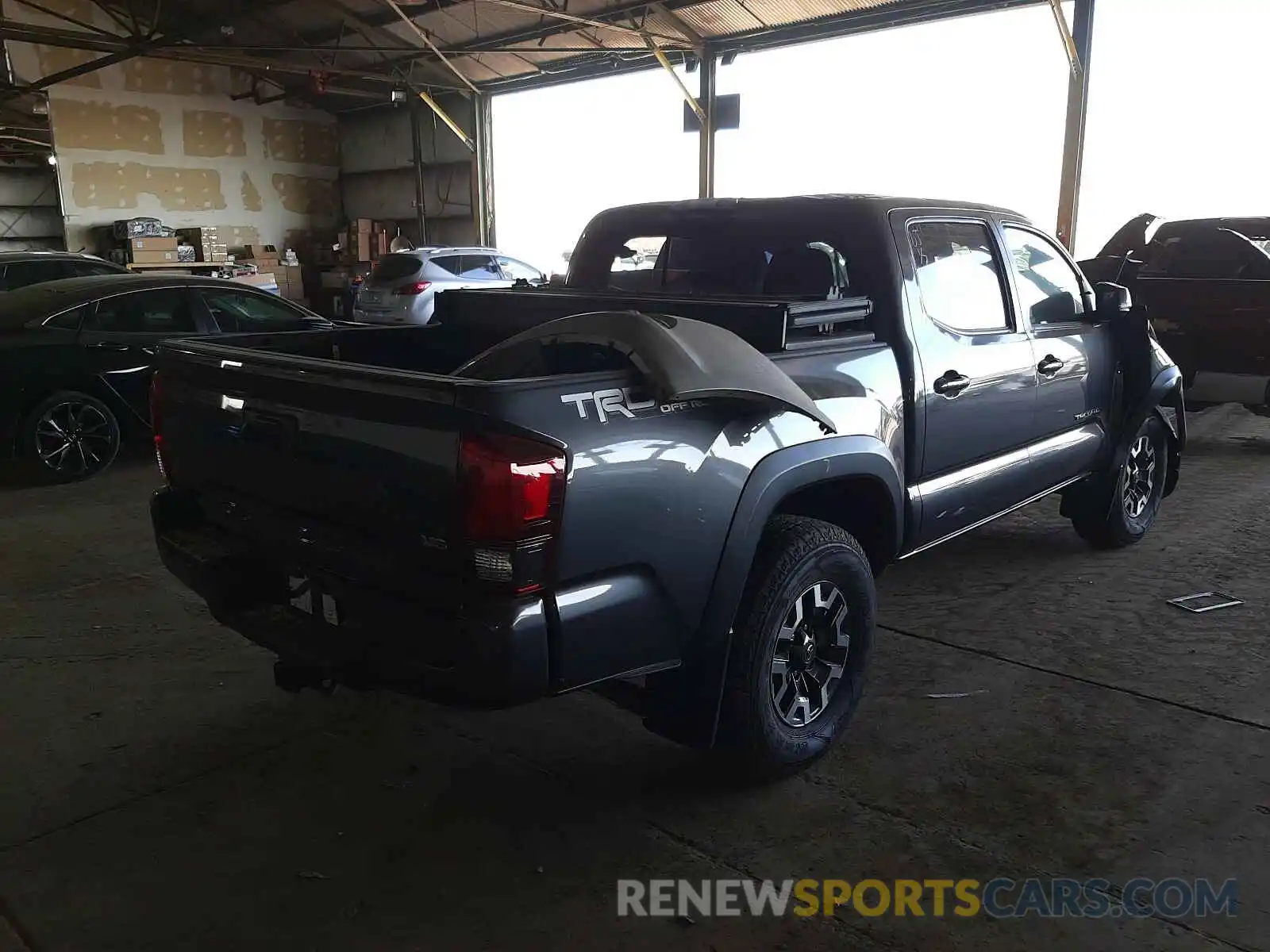 4 Photograph of a damaged car 3TMCZ5AN9KM263131 TOYOTA TACOMA 2019