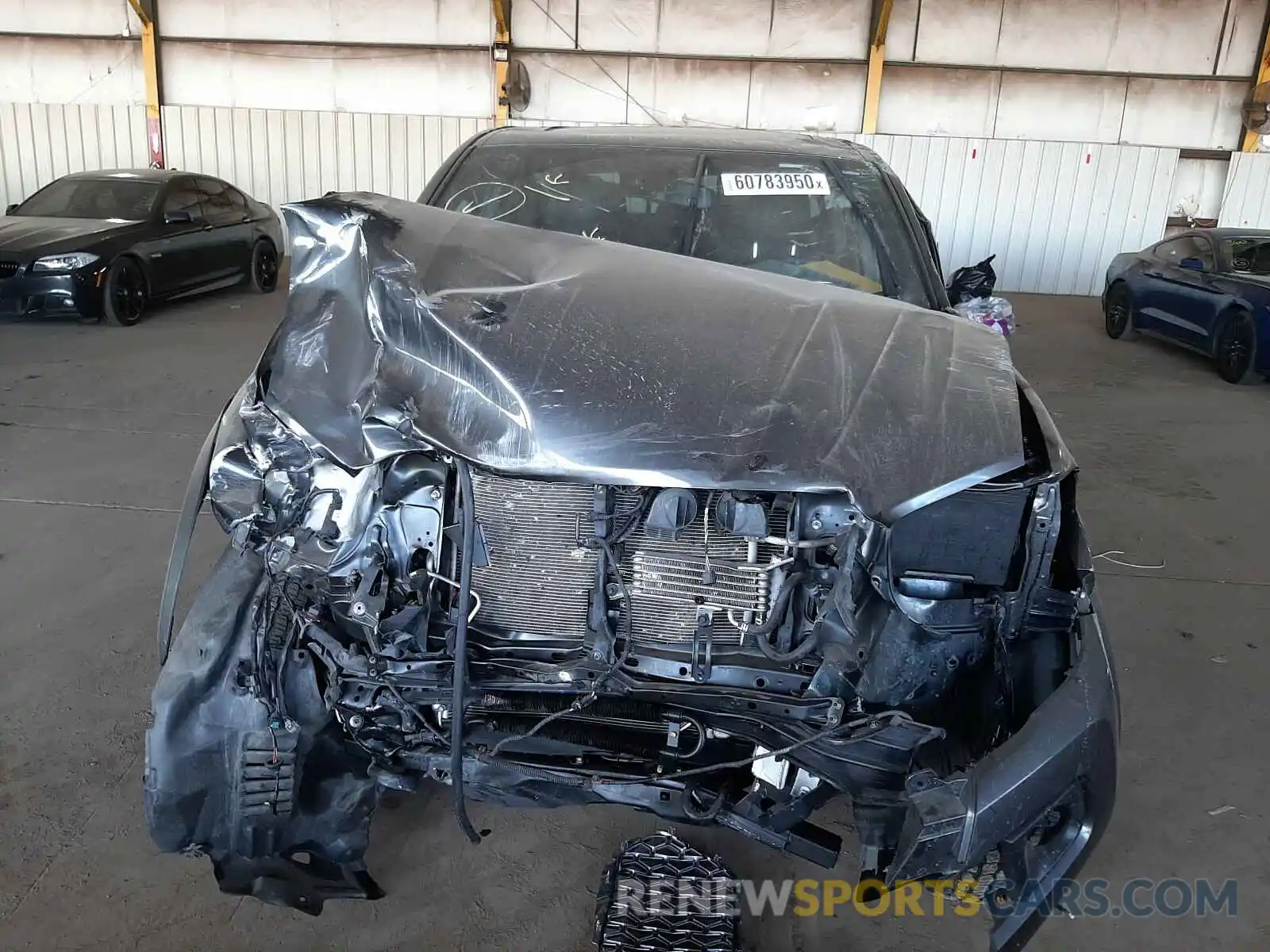 7 Photograph of a damaged car 3TMCZ5AN9KM263131 TOYOTA TACOMA 2019