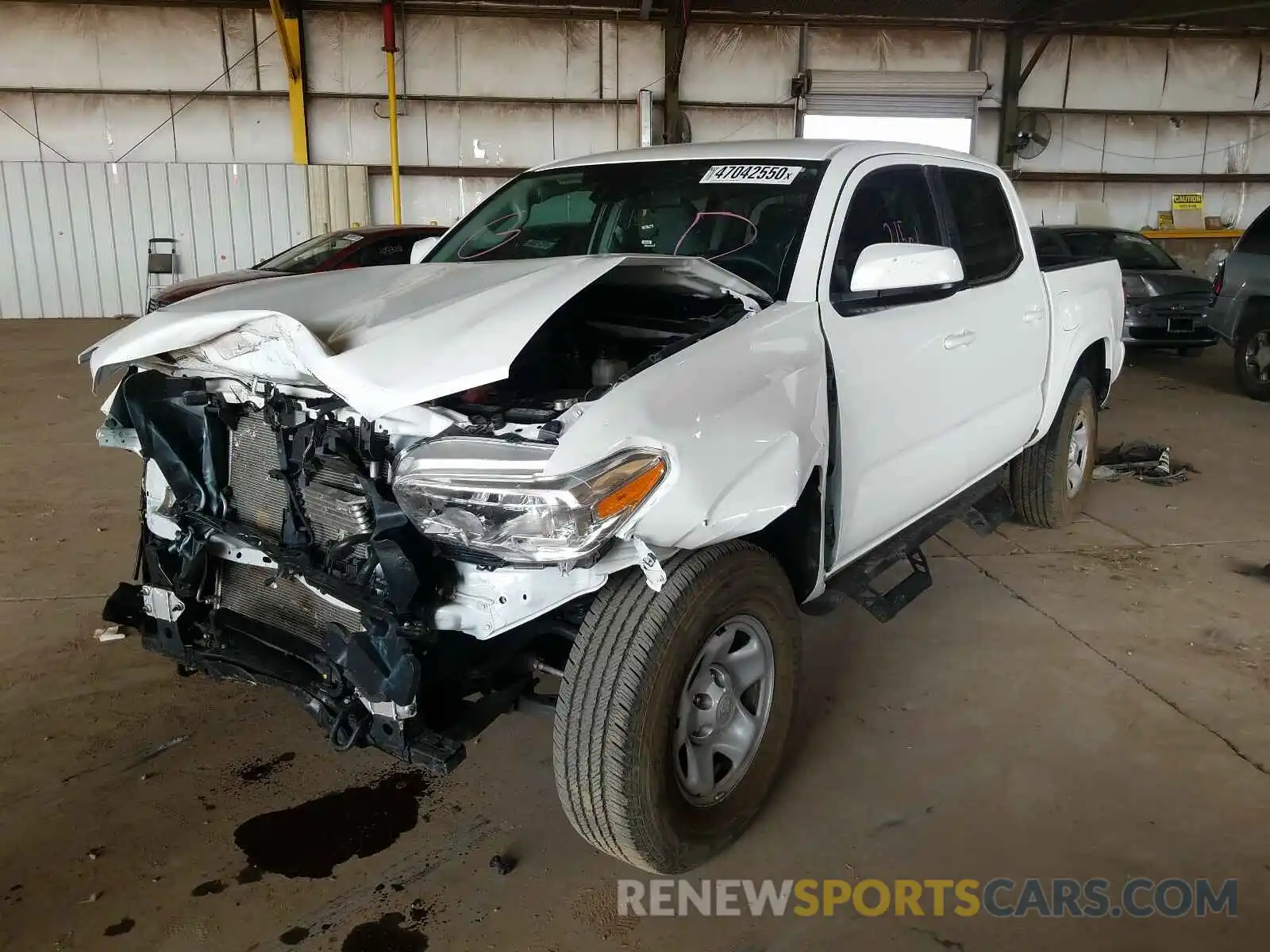 2 Photograph of a damaged car 3TMCZ5AN9KM264036 TOYOTA TACOMA 2019