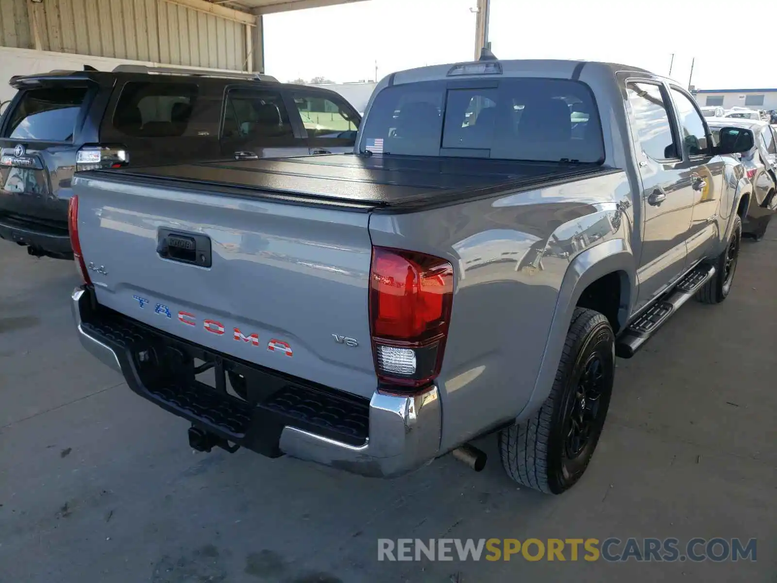 4 Photograph of a damaged car 3TMCZ5AN9KM266272 TOYOTA TACOMA 2019