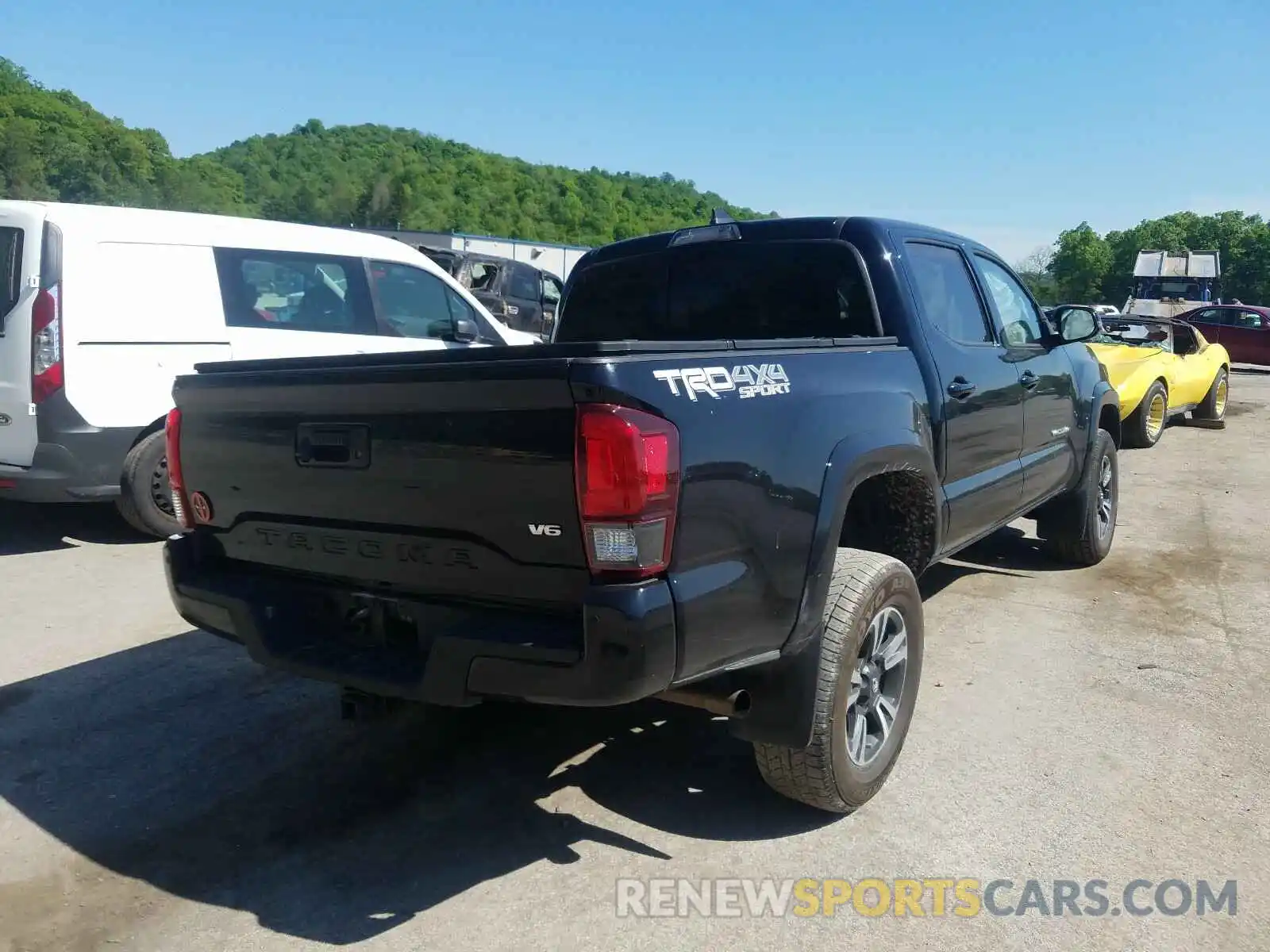 4 Photograph of a damaged car 3TMCZ5AN9KM268264 TOYOTA TACOMA 2019