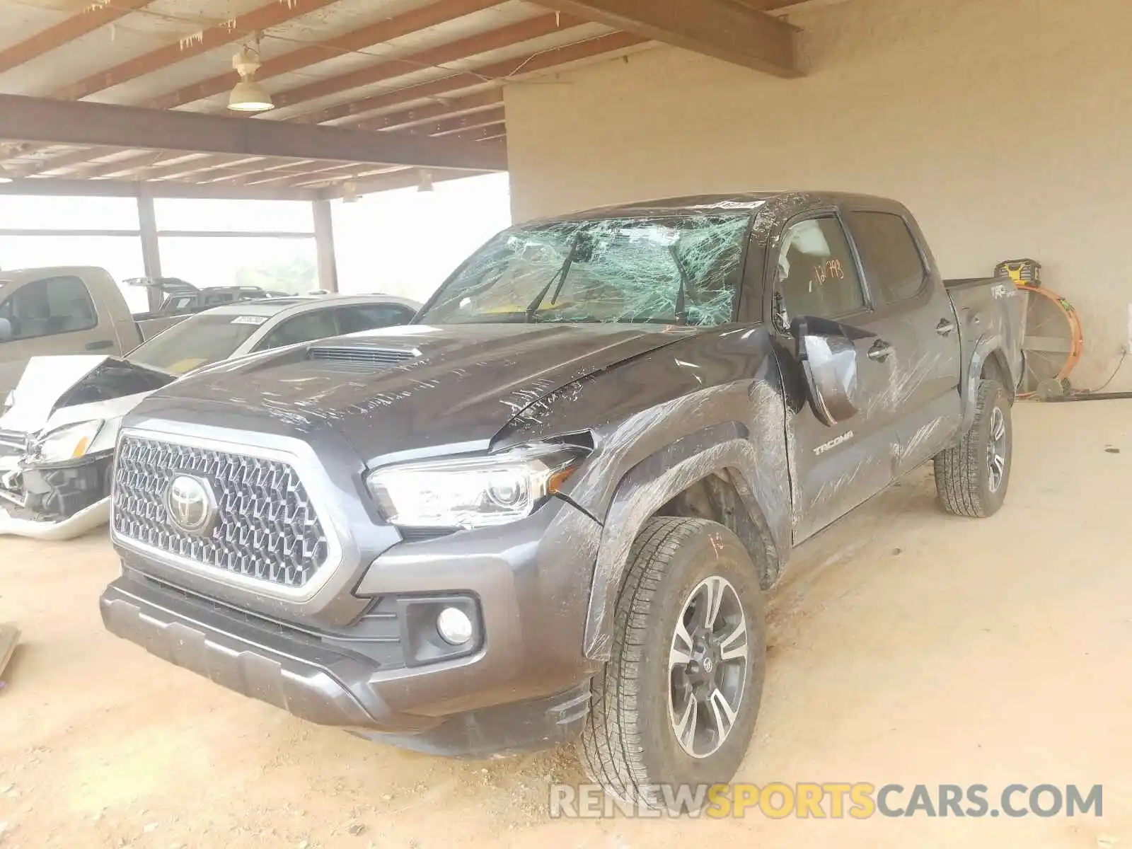 2 Photograph of a damaged car 3TMCZ5AN9KM270063 TOYOTA TACOMA 2019