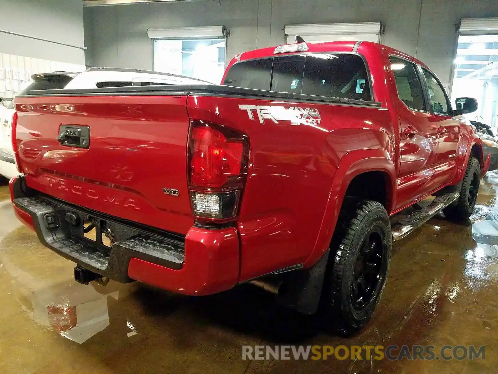 4 Photograph of a damaged car 3TMCZ5AN9KM271634 TOYOTA TACOMA 2019