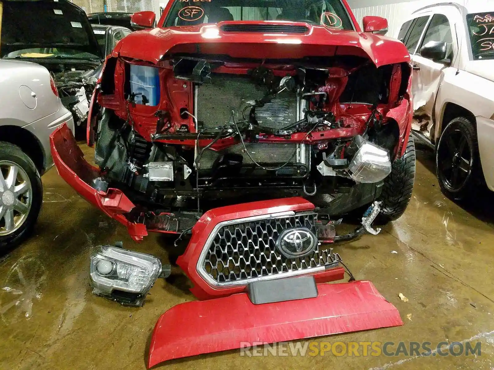 9 Photograph of a damaged car 3TMCZ5AN9KM271634 TOYOTA TACOMA 2019