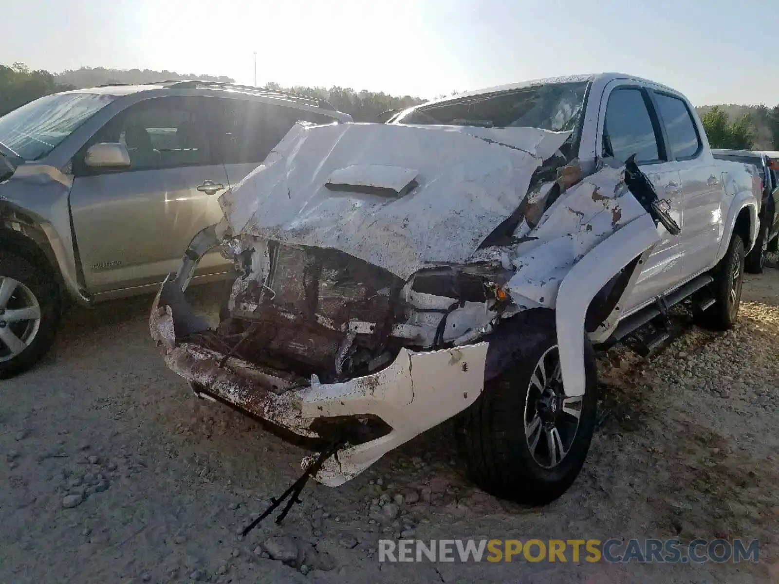 2 Photograph of a damaged car 3TMCZ5AN9KM272315 TOYOTA TACOMA 2019