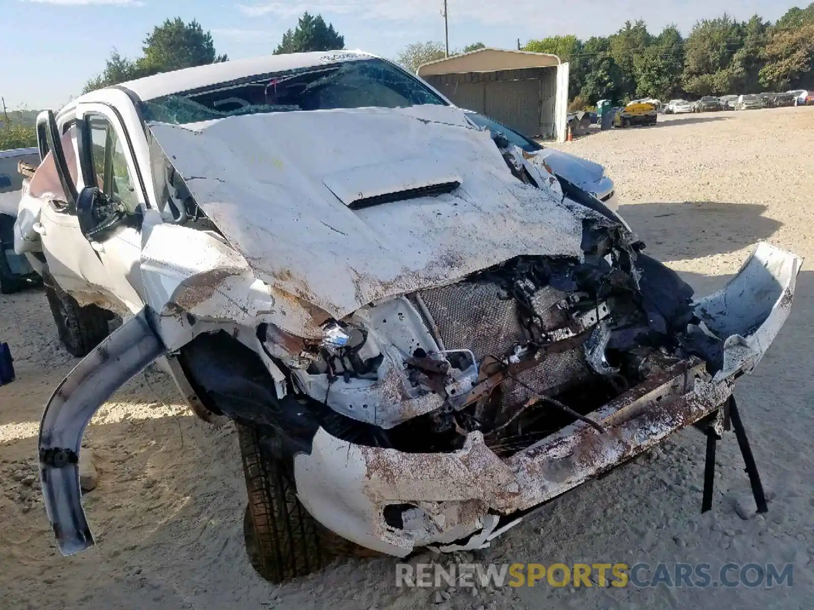 9 Photograph of a damaged car 3TMCZ5AN9KM272315 TOYOTA TACOMA 2019