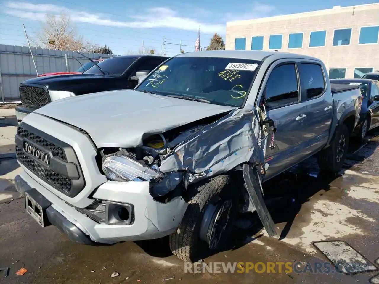 2 Photograph of a damaged car 3TMCZ5AN9KM275831 TOYOTA TACOMA 2019