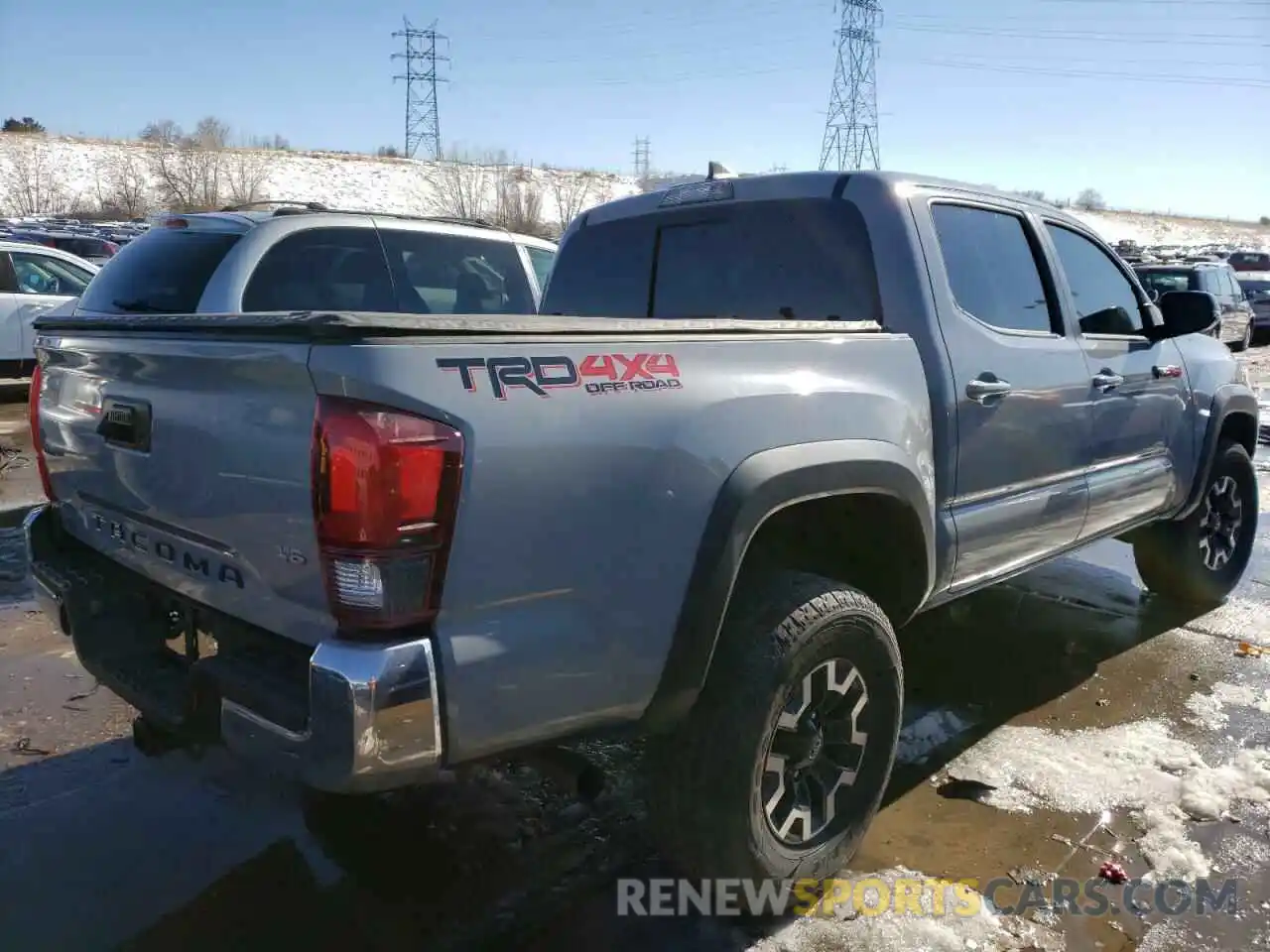 4 Photograph of a damaged car 3TMCZ5AN9KM275831 TOYOTA TACOMA 2019