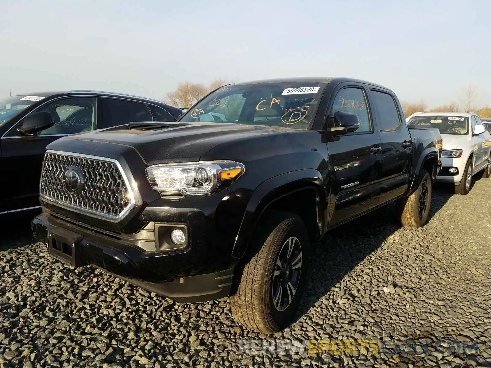 2 Photograph of a damaged car 3TMCZ5AN9KM276963 TOYOTA TACOMA 2019