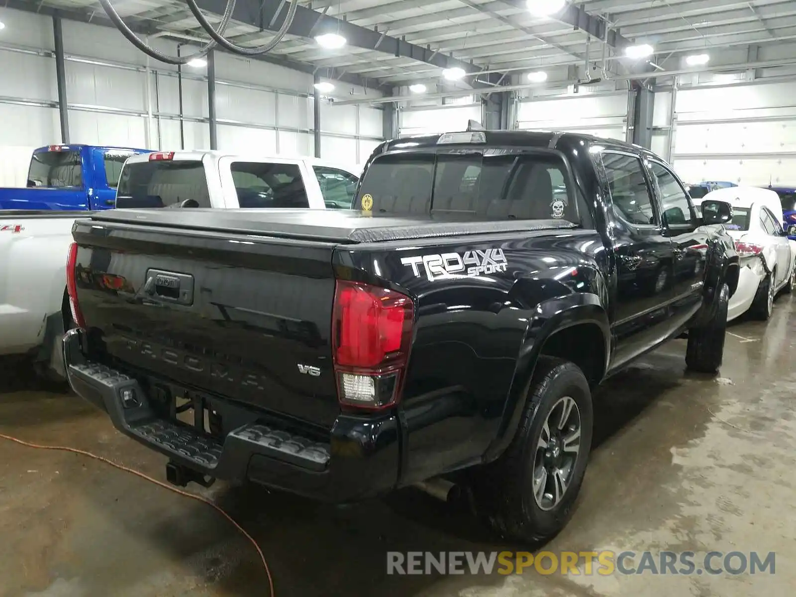 4 Photograph of a damaged car 3TMCZ5AN9KM276963 TOYOTA TACOMA 2019