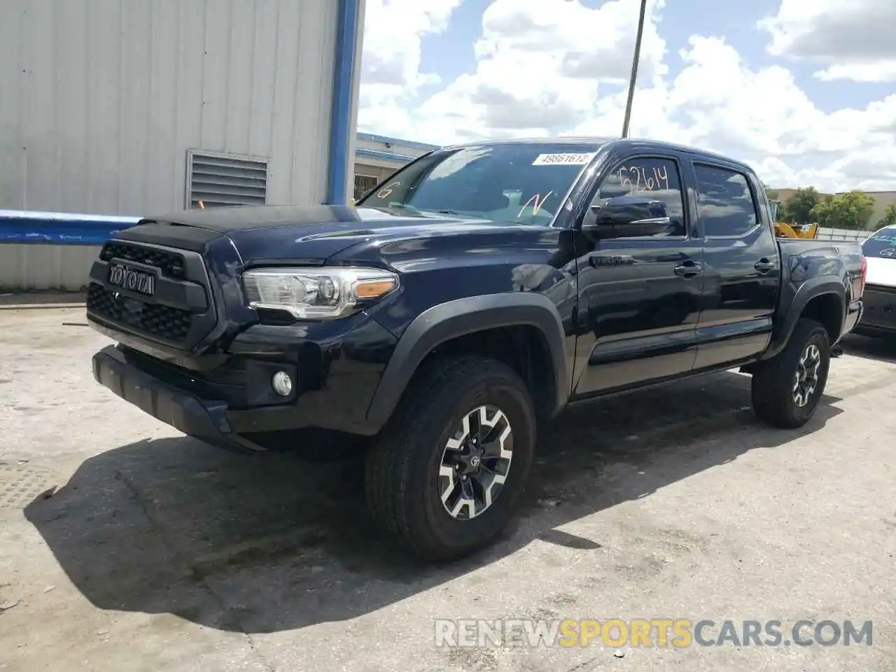 2 Photograph of a damaged car 3TMCZ5AN9KM281550 TOYOTA TACOMA 2019