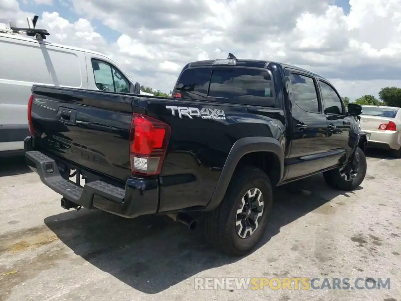 4 Photograph of a damaged car 3TMCZ5AN9KM281550 TOYOTA TACOMA 2019