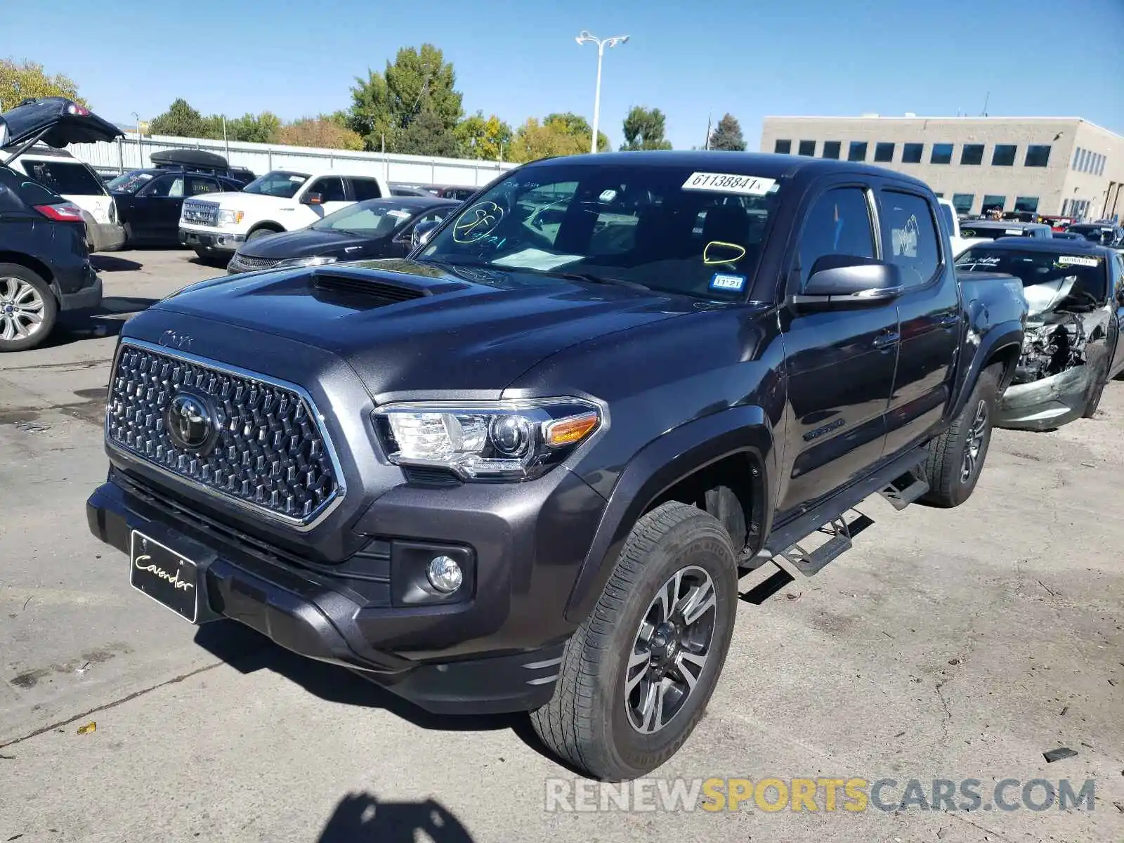 2 Photograph of a damaged car 3TMCZ5AN9KM285954 TOYOTA TACOMA 2019