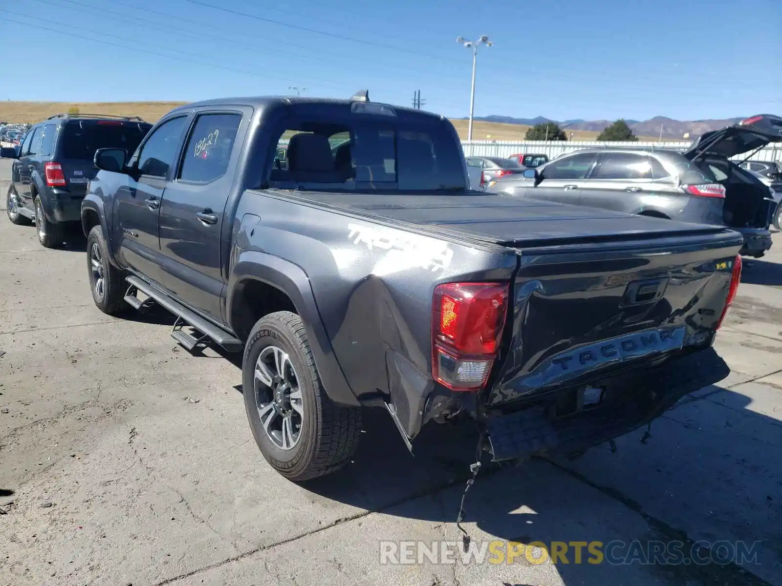 3 Photograph of a damaged car 3TMCZ5AN9KM285954 TOYOTA TACOMA 2019