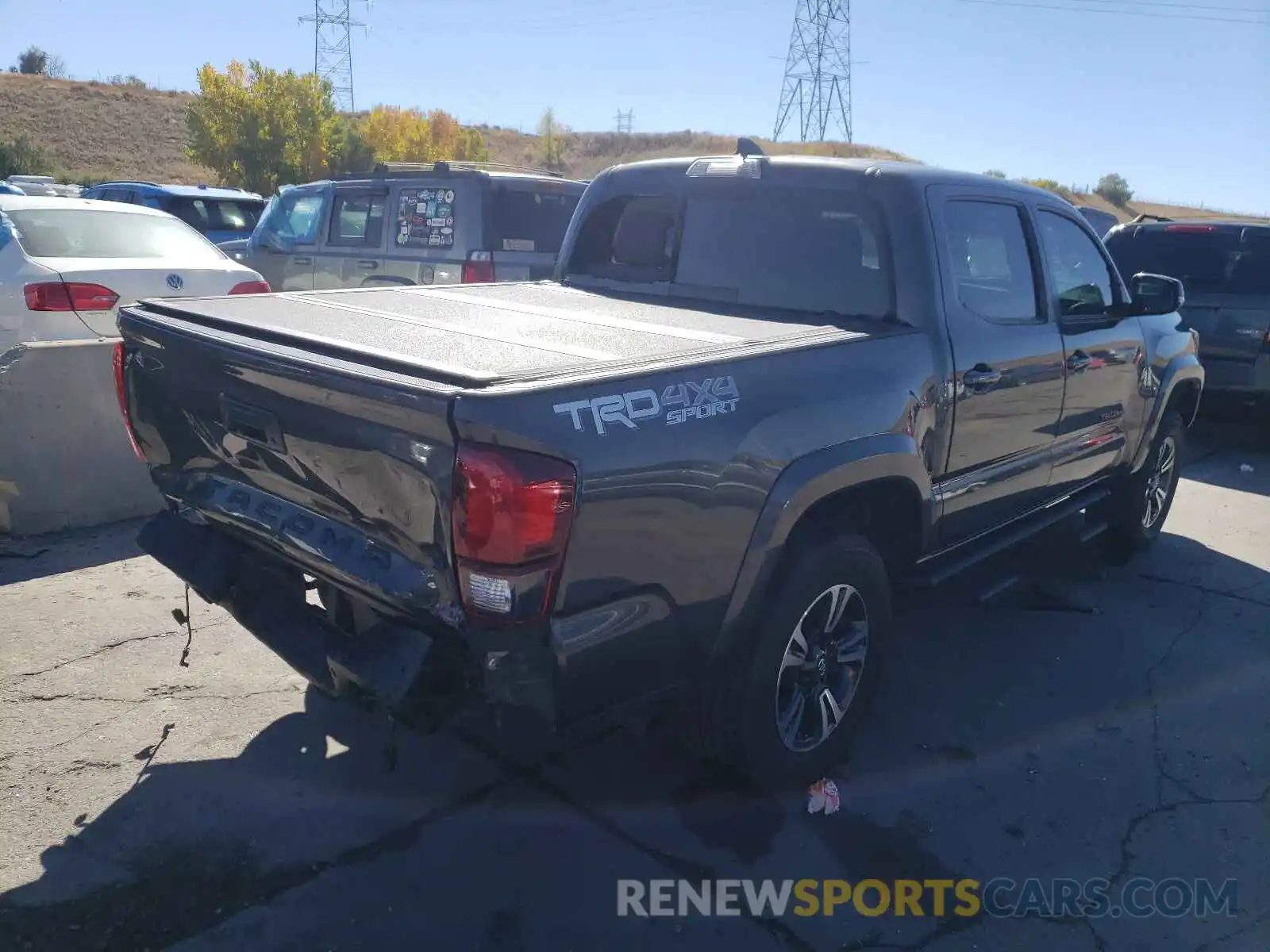 4 Photograph of a damaged car 3TMCZ5AN9KM285954 TOYOTA TACOMA 2019