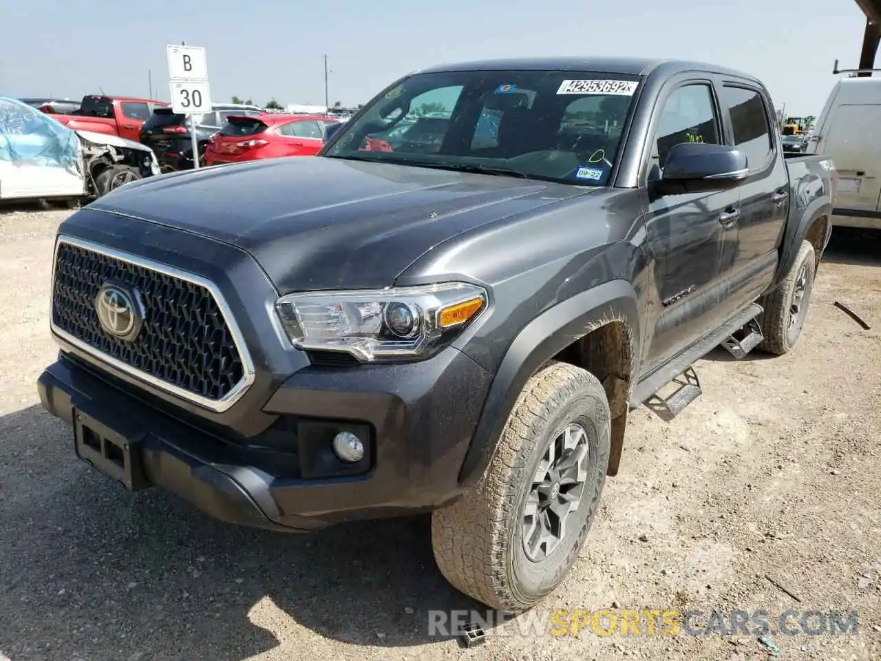 2 Photograph of a damaged car 3TMCZ5AN9KM285999 TOYOTA TACOMA 2019