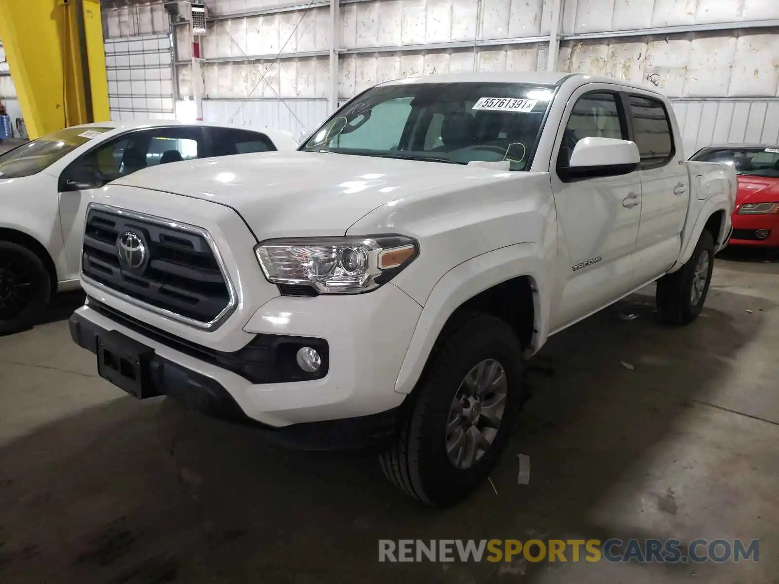 2 Photograph of a damaged car 3TMCZ5ANXKM196877 TOYOTA TACOMA 2019