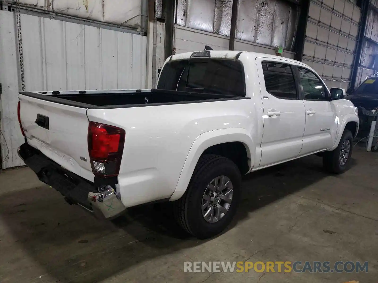 4 Photograph of a damaged car 3TMCZ5ANXKM196877 TOYOTA TACOMA 2019