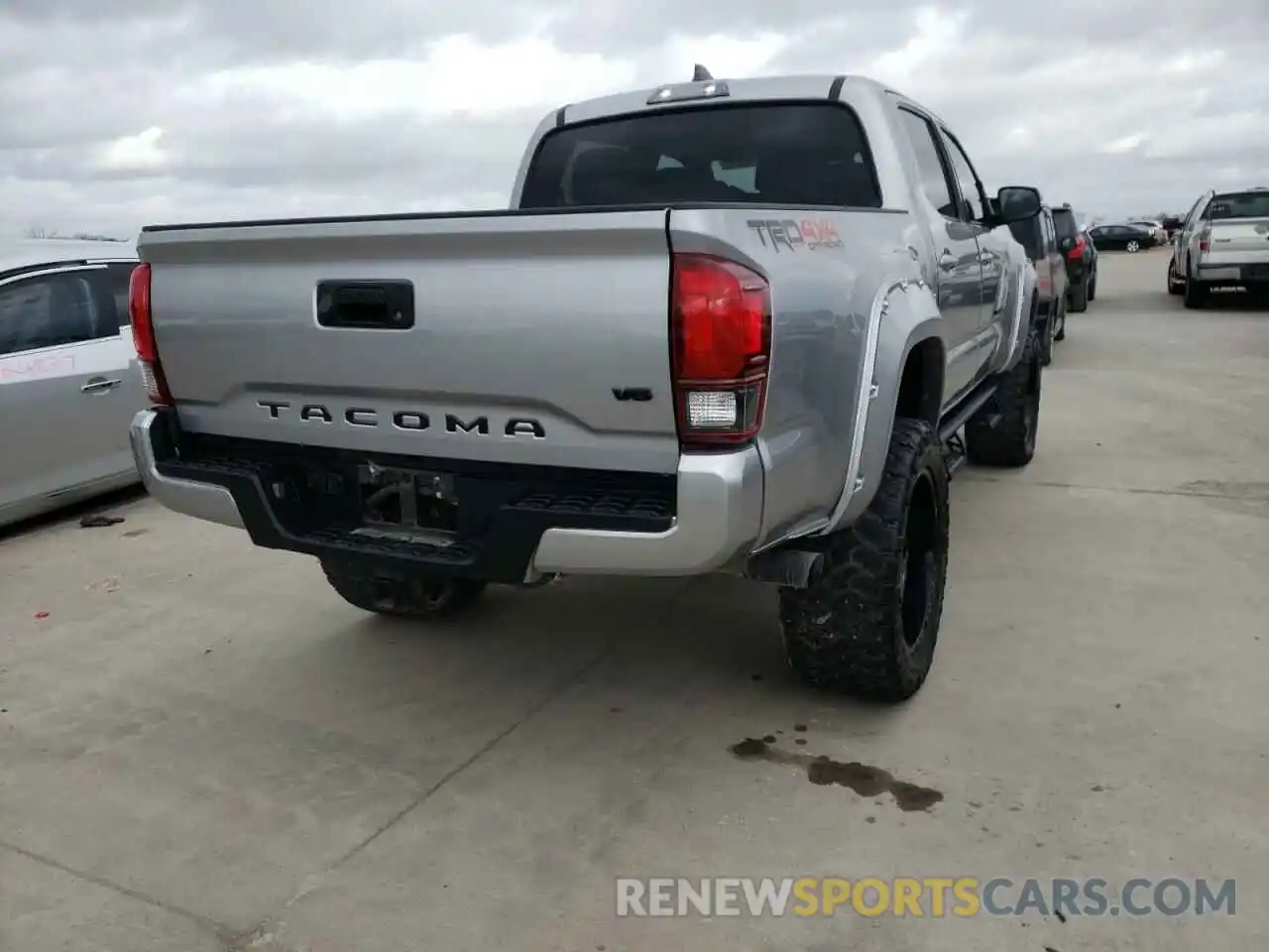 4 Photograph of a damaged car 3TMCZ5ANXKM198306 TOYOTA TACOMA 2019