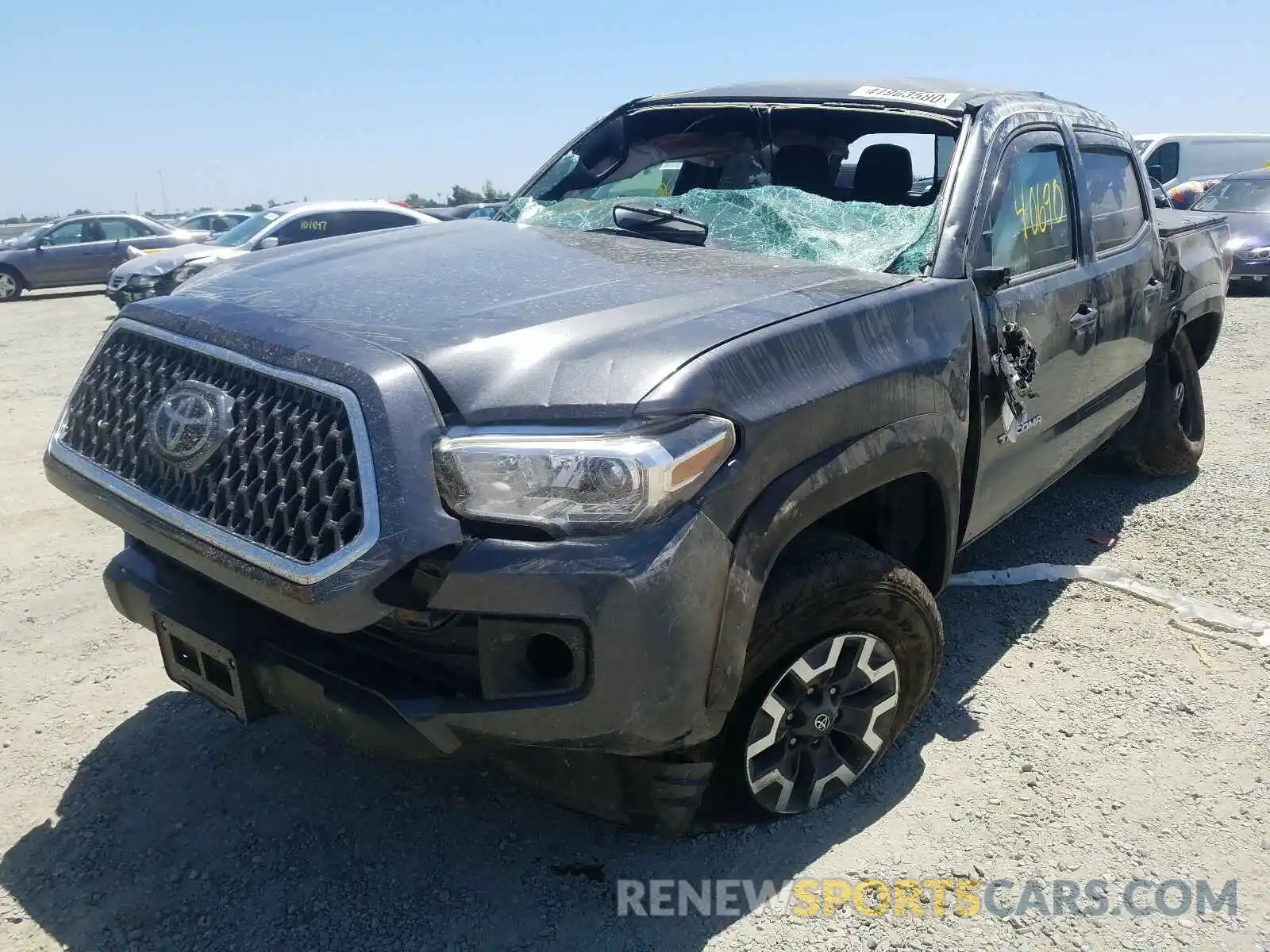 2 Photograph of a damaged car 3TMCZ5ANXKM199780 TOYOTA TACOMA 2019