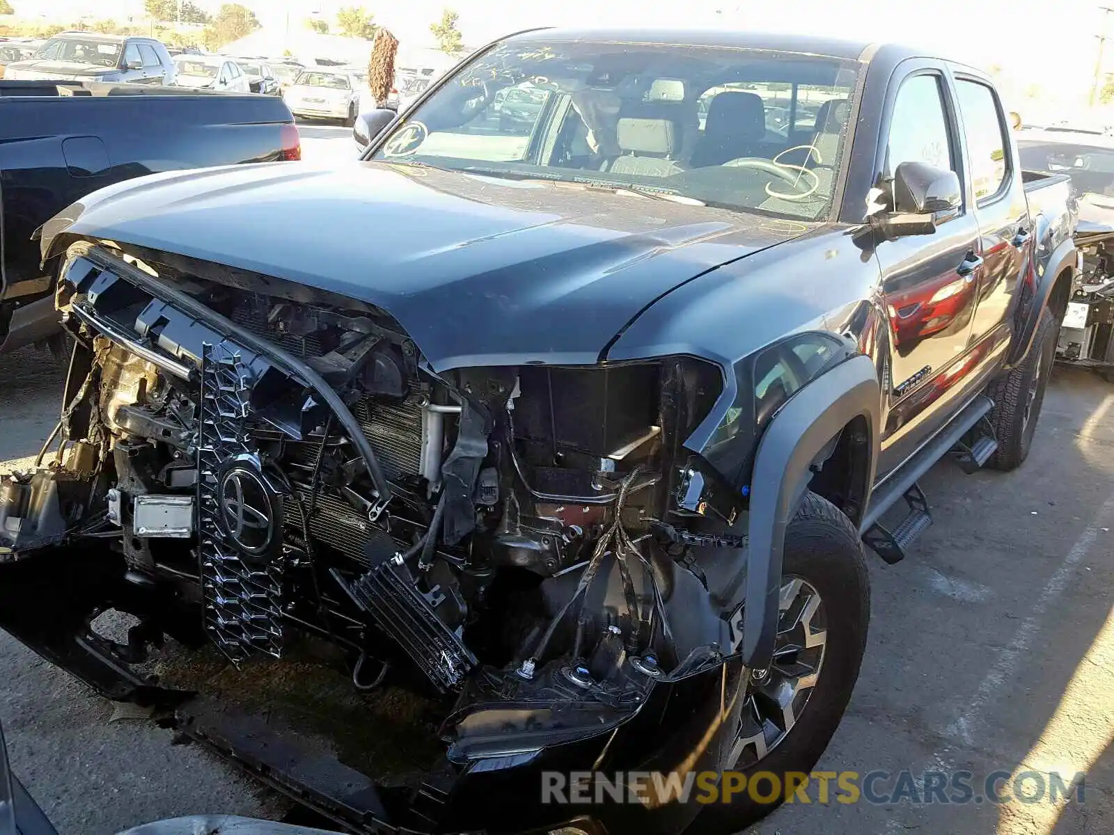 2 Photograph of a damaged car 3TMCZ5ANXKM201883 TOYOTA TACOMA 2019