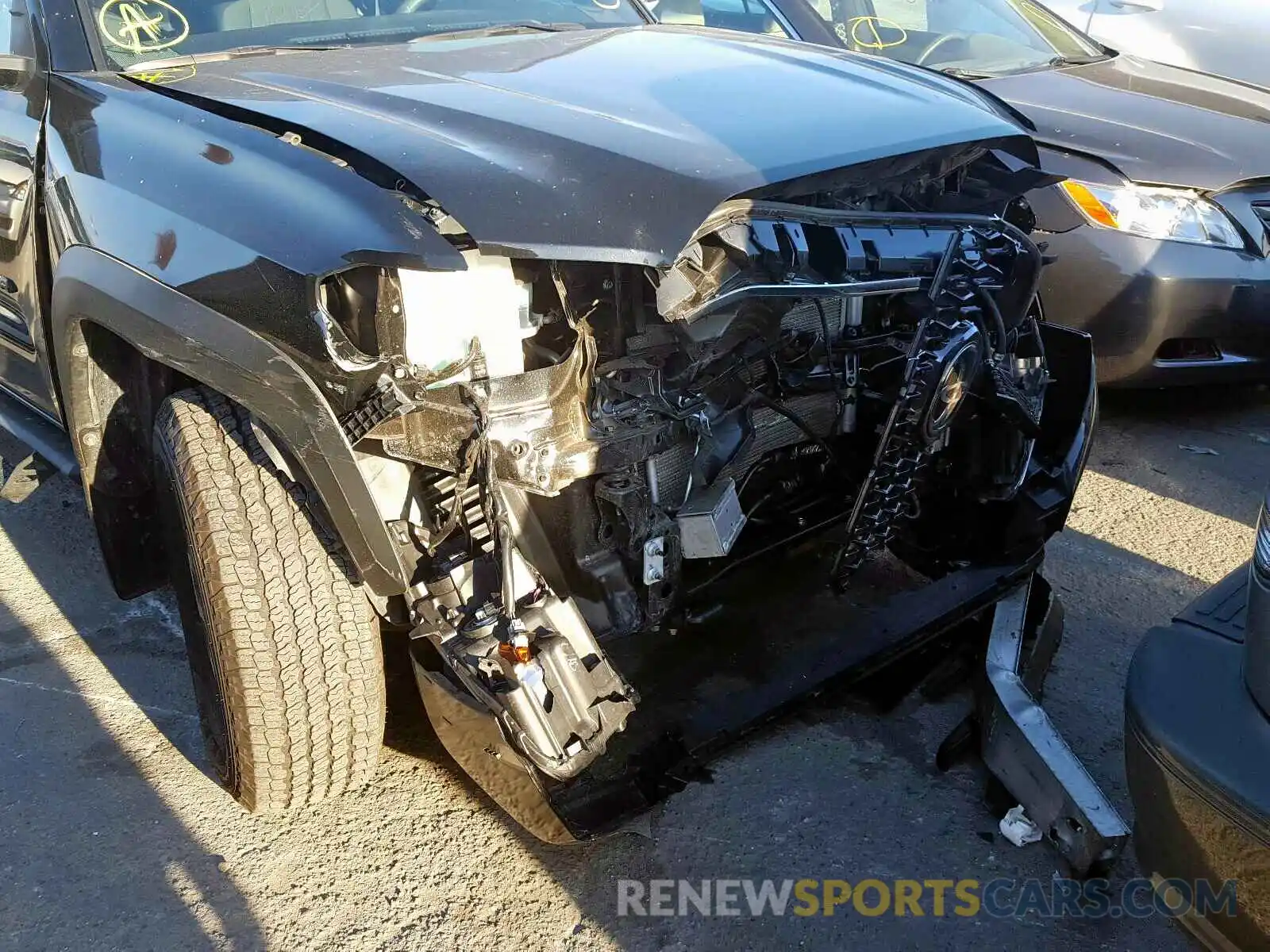 9 Photograph of a damaged car 3TMCZ5ANXKM201883 TOYOTA TACOMA 2019