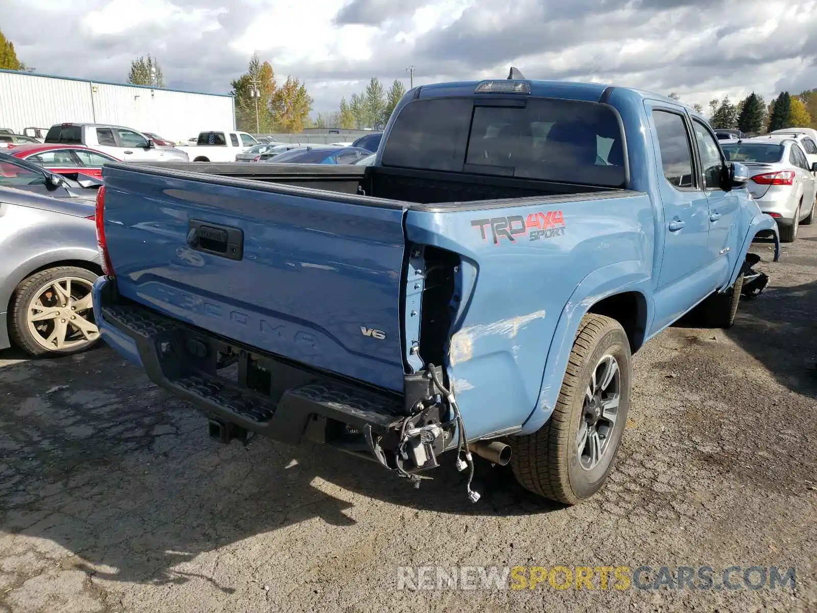 4 Photograph of a damaged car 3TMCZ5ANXKM202855 TOYOTA TACOMA 2019