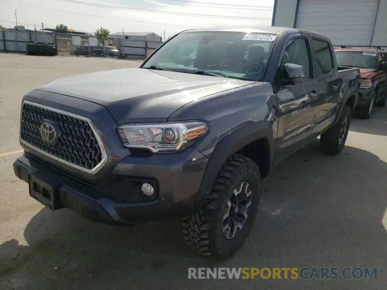 2 Photograph of a damaged car 3TMCZ5ANXKM204461 TOYOTA TACOMA 2019