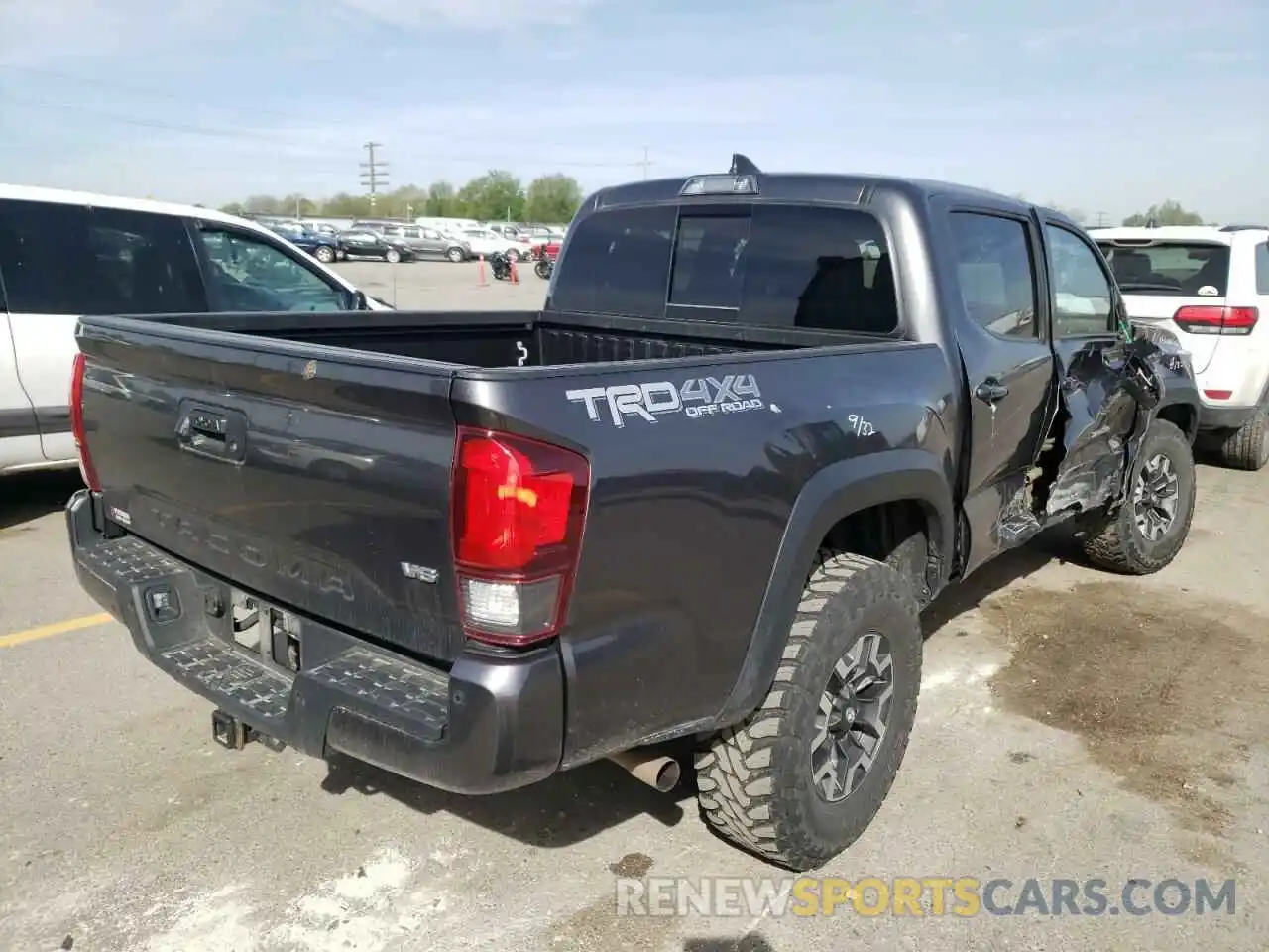 4 Photograph of a damaged car 3TMCZ5ANXKM204461 TOYOTA TACOMA 2019