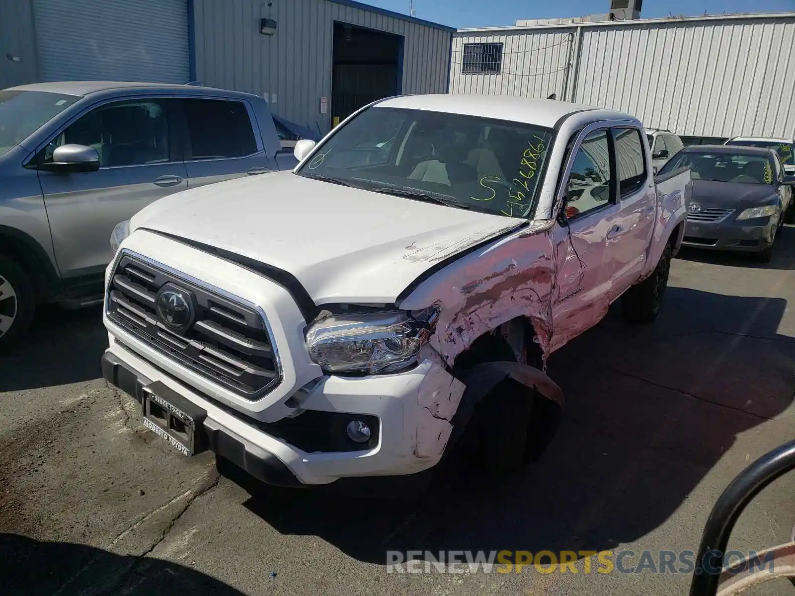 2 Photograph of a damaged car 3TMCZ5ANXKM204637 TOYOTA TACOMA 2019