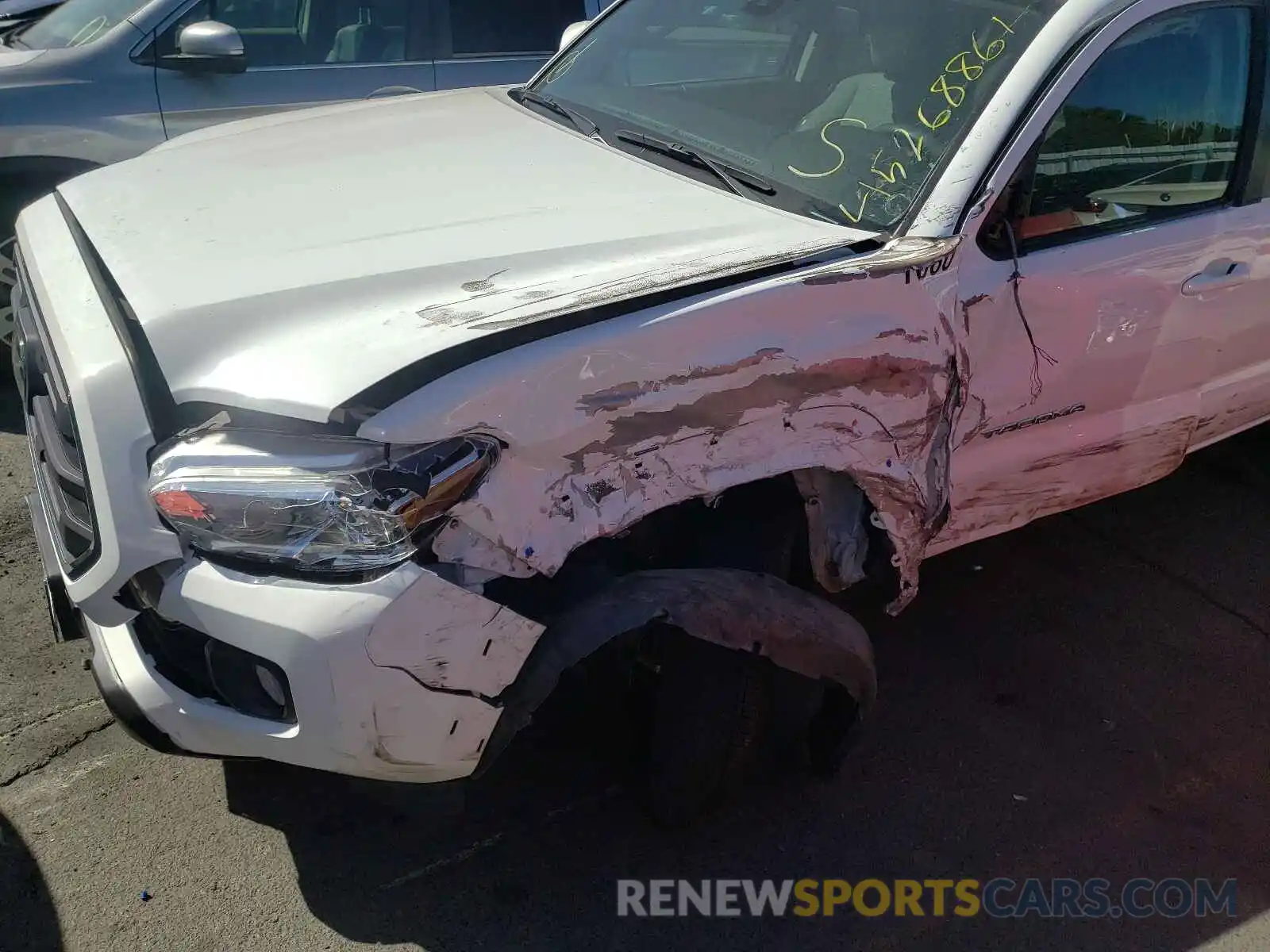 9 Photograph of a damaged car 3TMCZ5ANXKM204637 TOYOTA TACOMA 2019