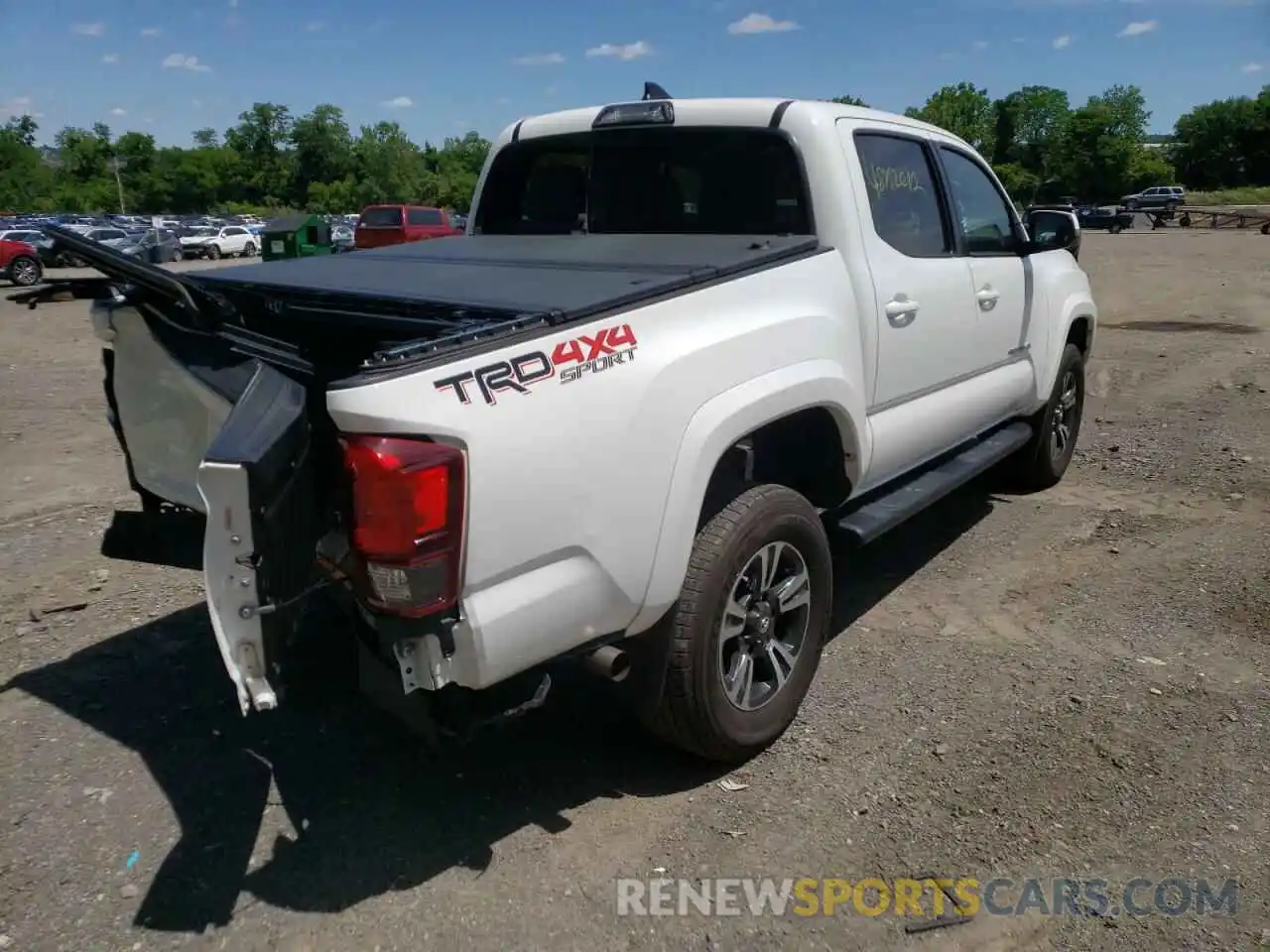 4 Photograph of a damaged car 3TMCZ5ANXKM208753 TOYOTA TACOMA 2019