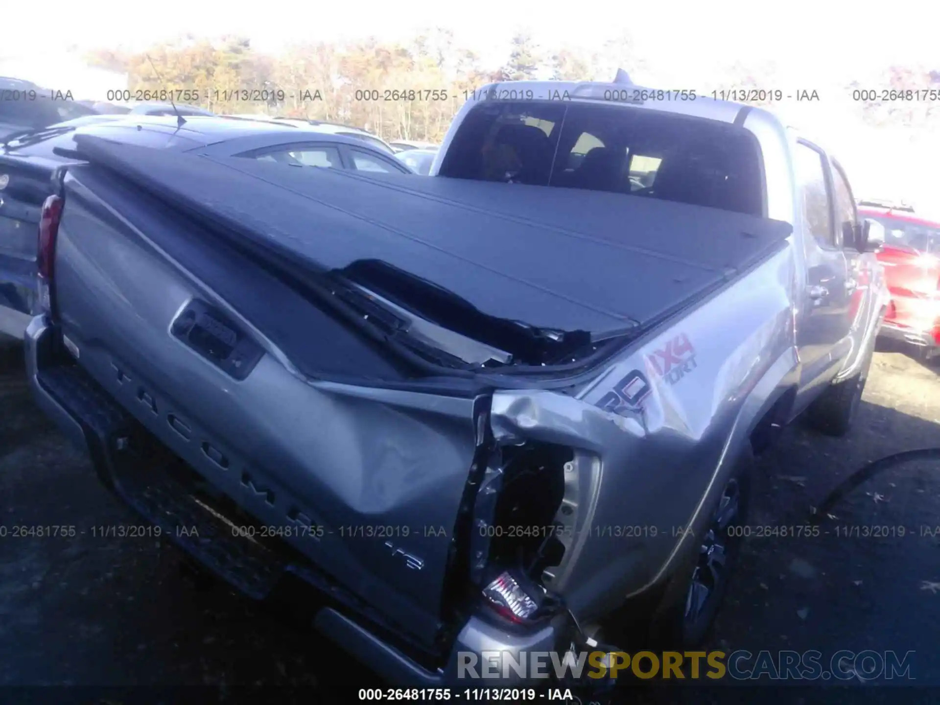 4 Photograph of a damaged car 3TMCZ5ANXKM214939 TOYOTA TACOMA 2019