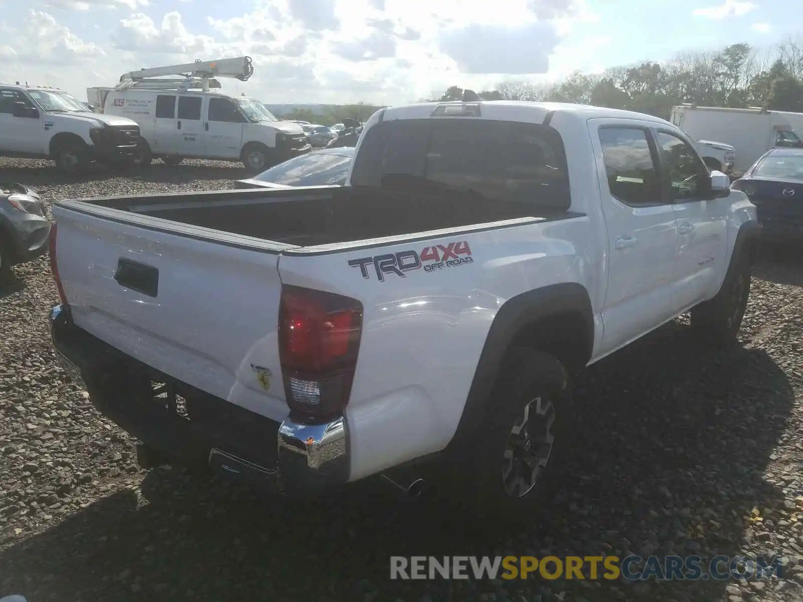 4 Photograph of a damaged car 3TMCZ5ANXKM215380 TOYOTA TACOMA 2019