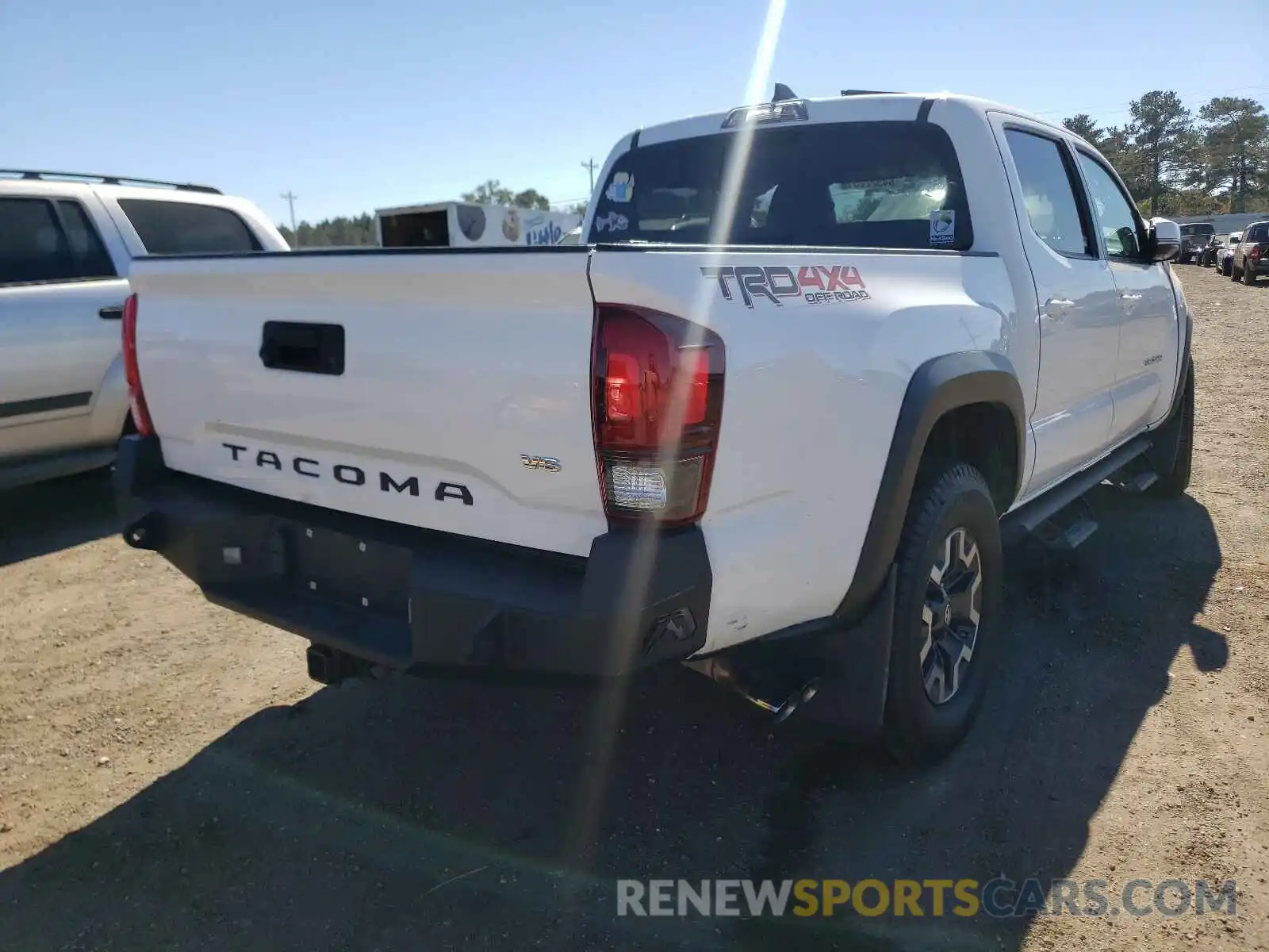 4 Photograph of a damaged car 3TMCZ5ANXKM217856 TOYOTA TACOMA 2019