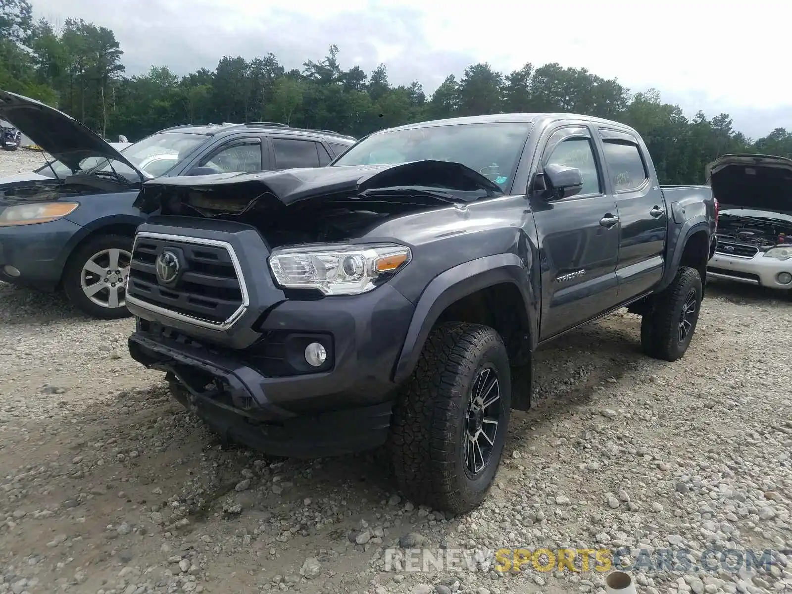 2 Photograph of a damaged car 3TMCZ5ANXKM219767 TOYOTA TACOMA 2019