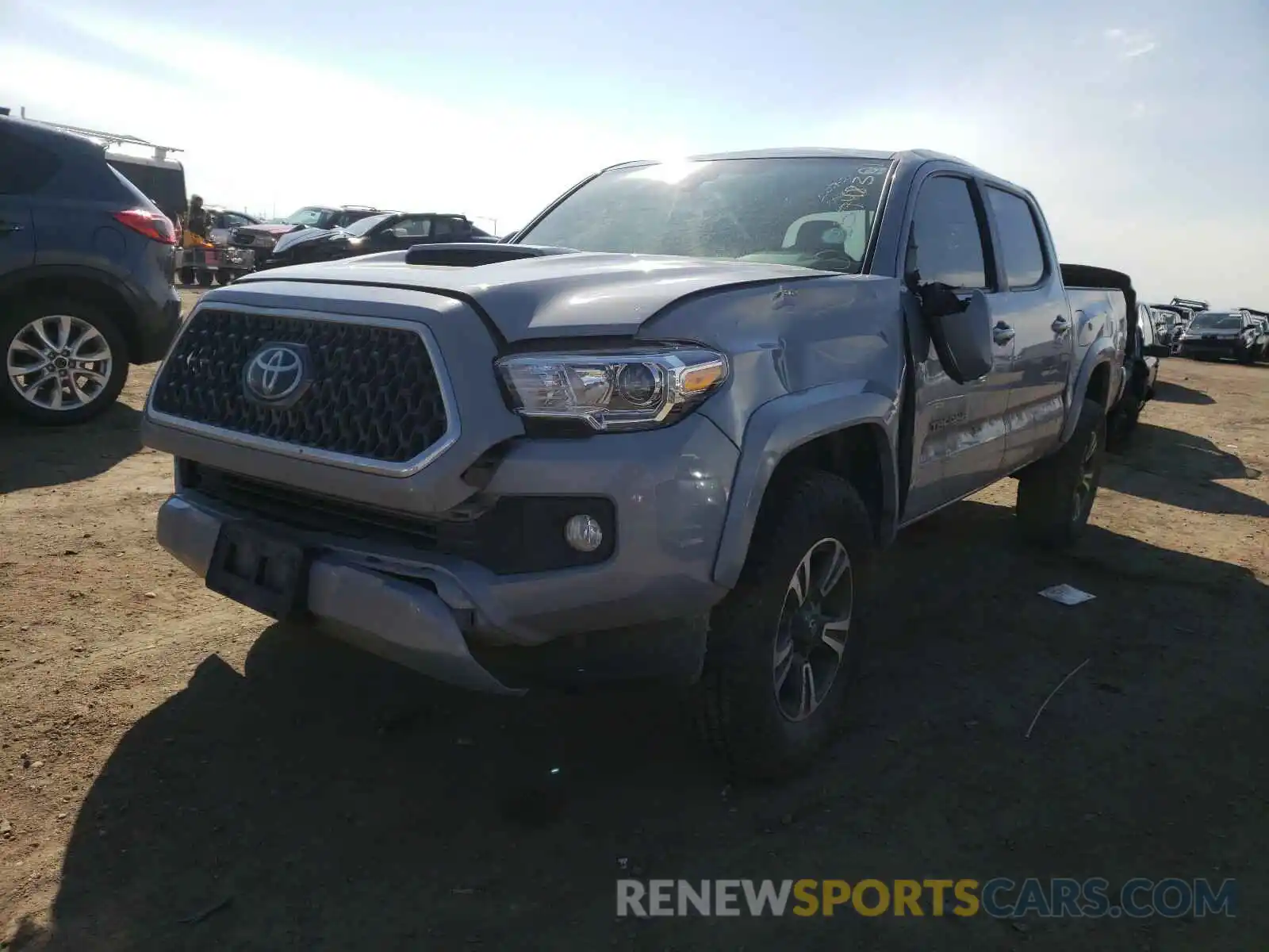 2 Photograph of a damaged car 3TMCZ5ANXKM223883 TOYOTA TACOMA 2019