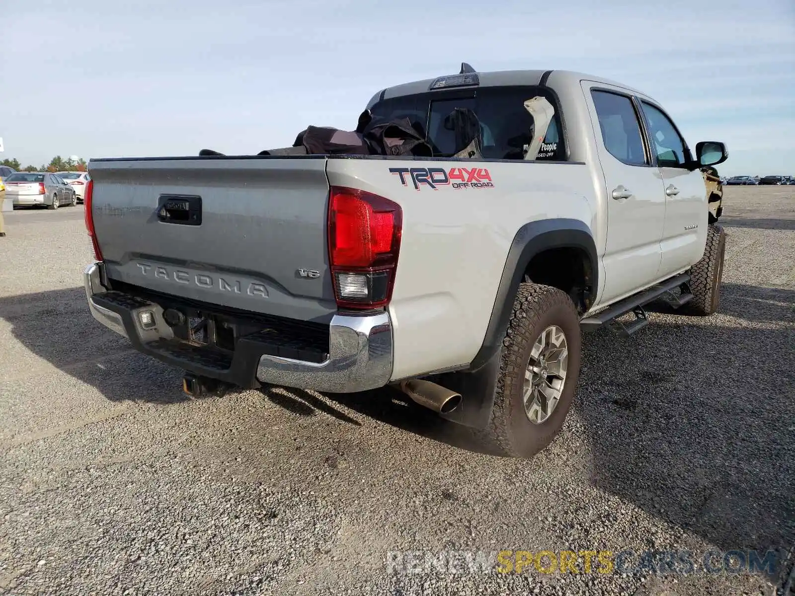 4 Photograph of a damaged car 3TMCZ5ANXKM224984 TOYOTA TACOMA 2019