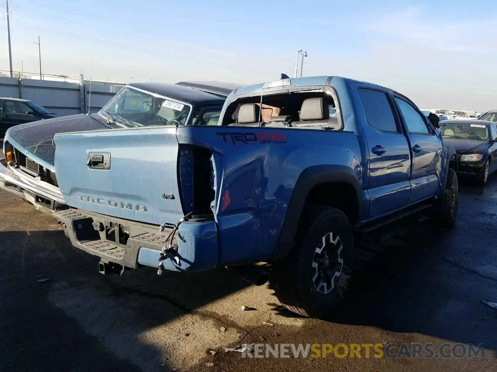 4 Photograph of a damaged car 3TMCZ5ANXKM225150 TOYOTA TACOMA 2019