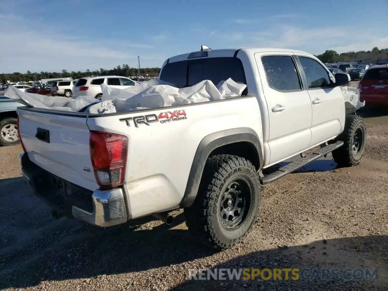 4 Photograph of a damaged car 3TMCZ5ANXKM226699 TOYOTA TACOMA 2019