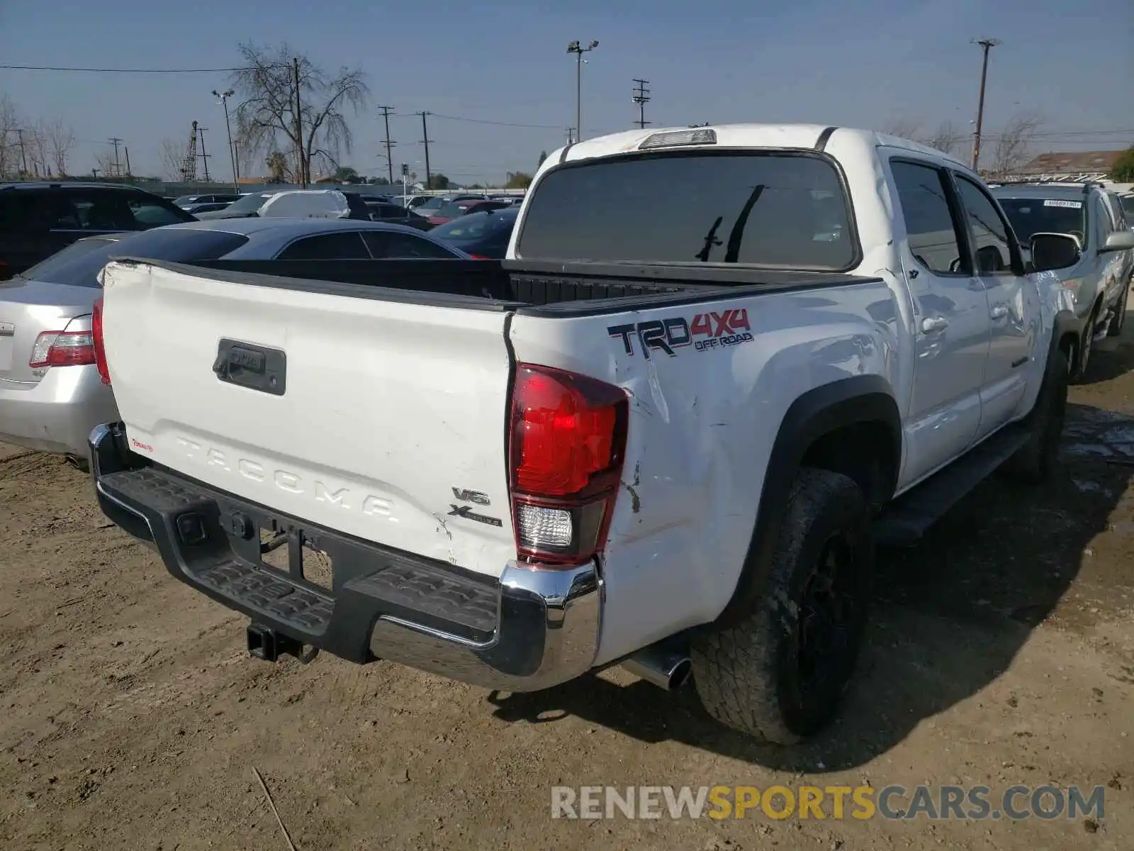 4 Photograph of a damaged car 3TMCZ5ANXKM232664 TOYOTA TACOMA 2019