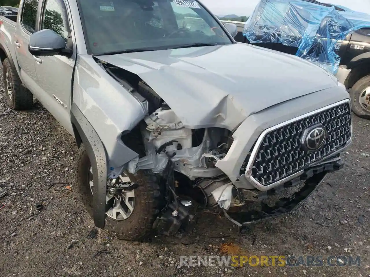 9 Photograph of a damaged car 3TMCZ5ANXKM239842 TOYOTA TACOMA 2019