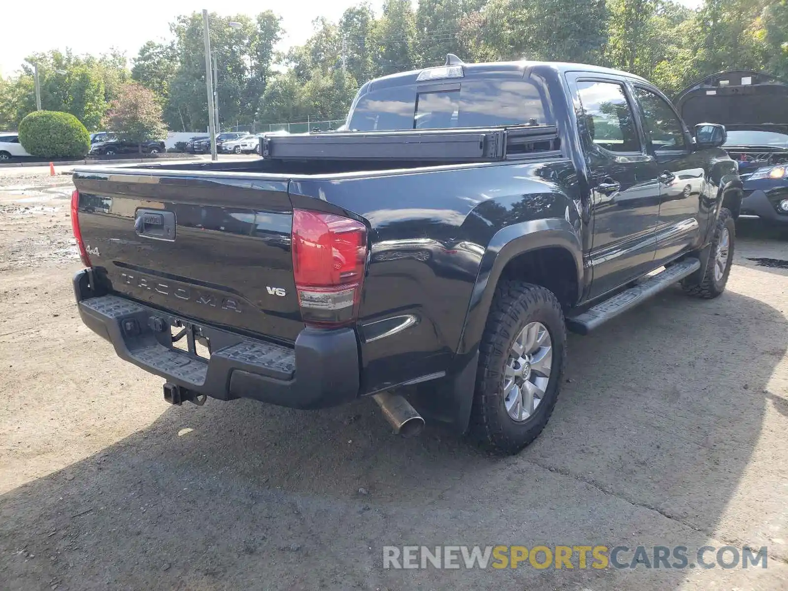 4 Photograph of a damaged car 3TMCZ5ANXKM240943 TOYOTA TACOMA 2019