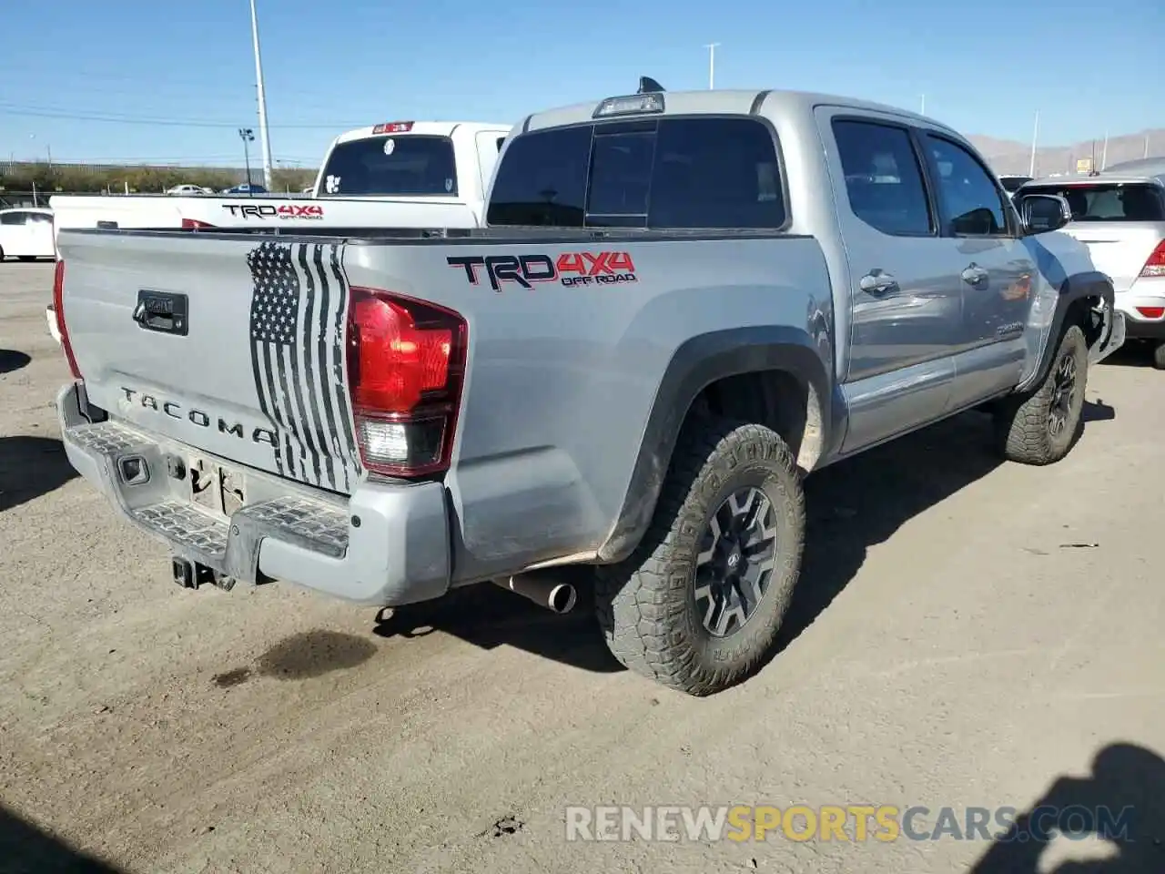 3 Photograph of a damaged car 3TMCZ5ANXKM241560 TOYOTA TACOMA 2019