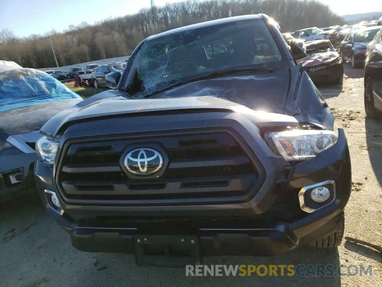 9 Photograph of a damaged car 3TMCZ5ANXKM242031 TOYOTA TACOMA 2019